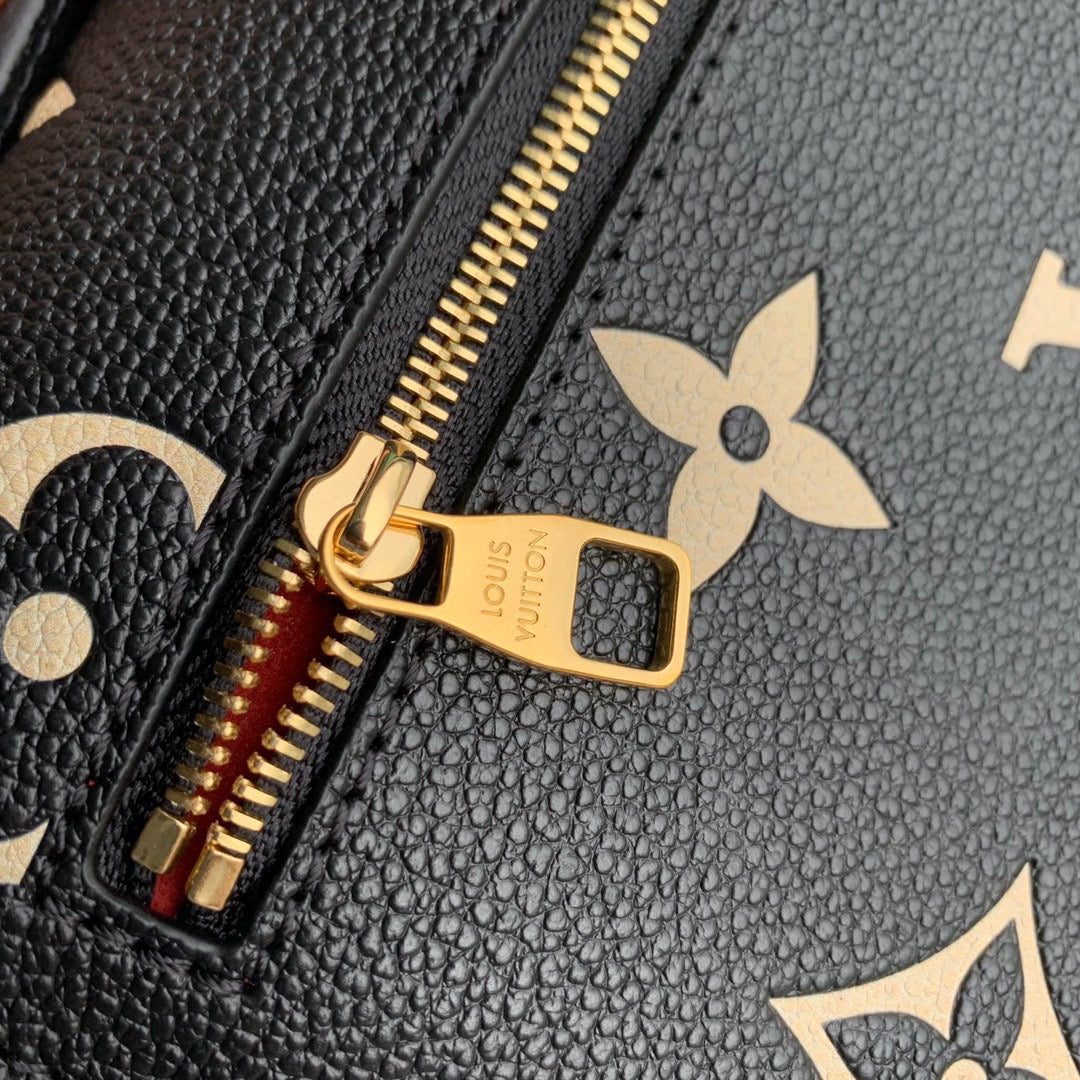 Pochette Métis East West 21 in Black and Beige Monogram Empreinte Calfskin Embossed Logo