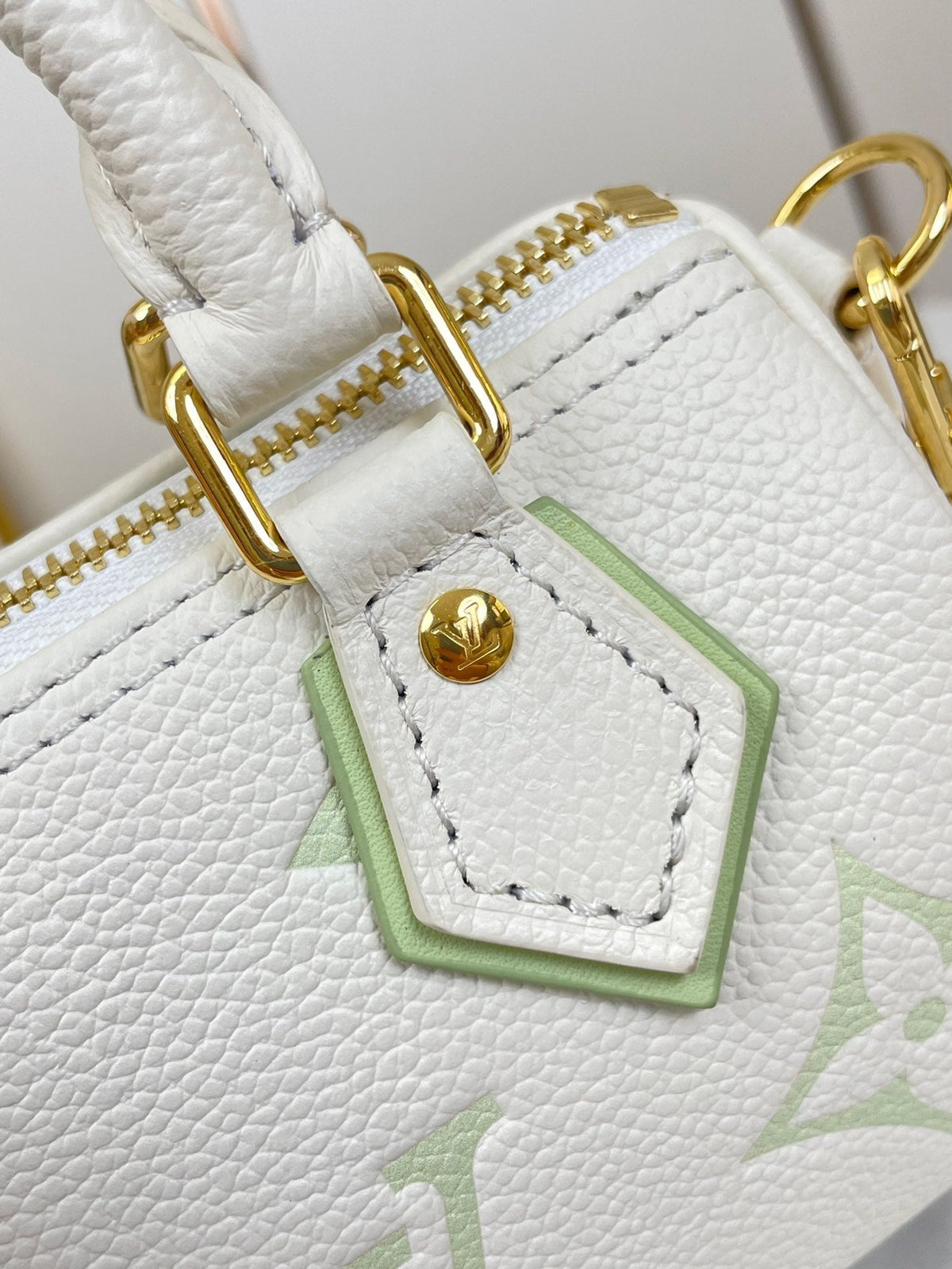 Nano Speedy 16 in White Latte Monogram Empreinte Leather Gold Hardware