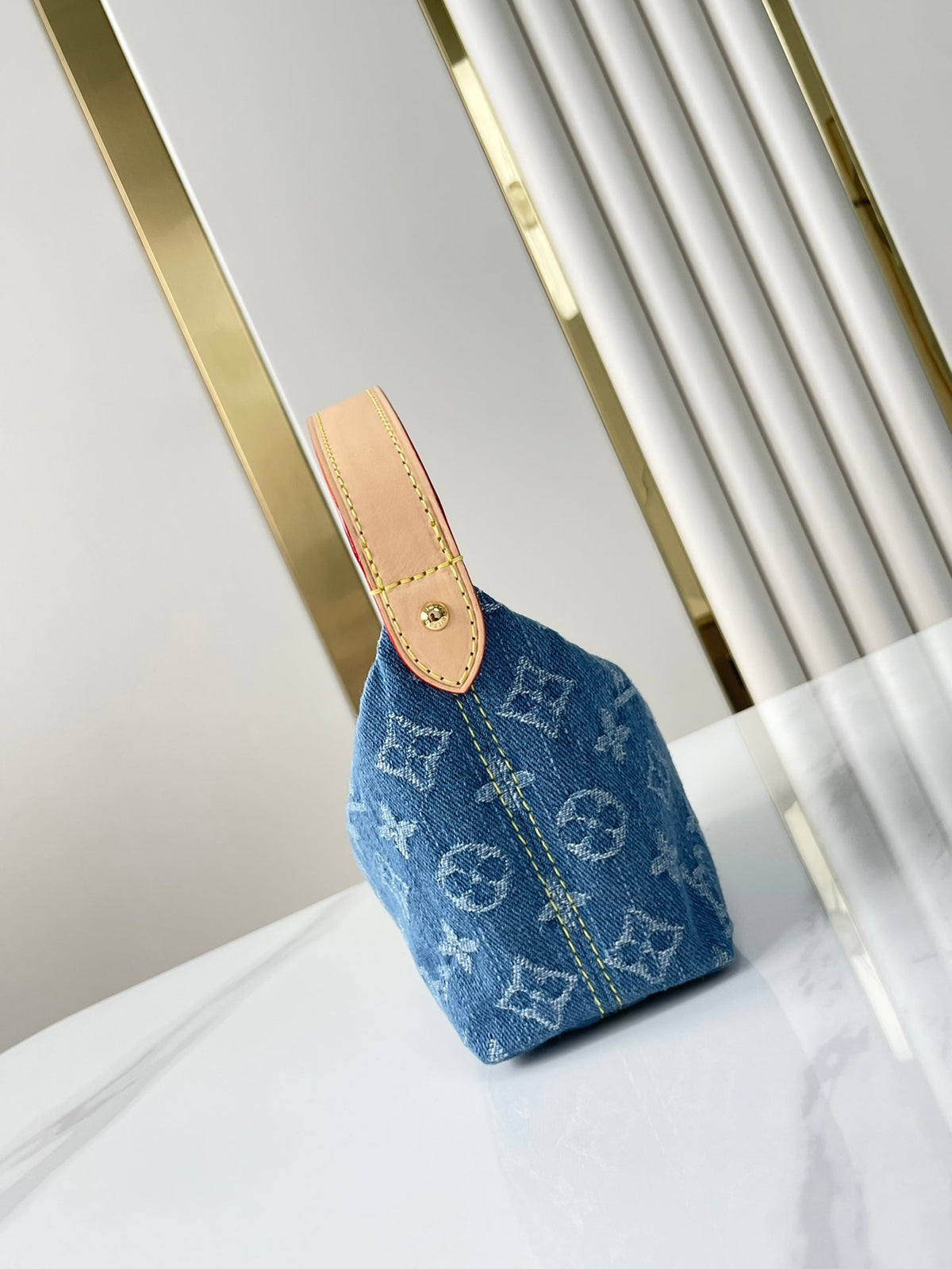 Hills Pochette 18 in Blue Monogram Denim
