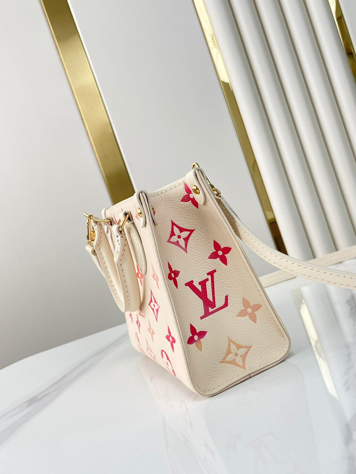 Onthego BB 18 in Sunrise Aquarelle Monogram Empreinte Leather