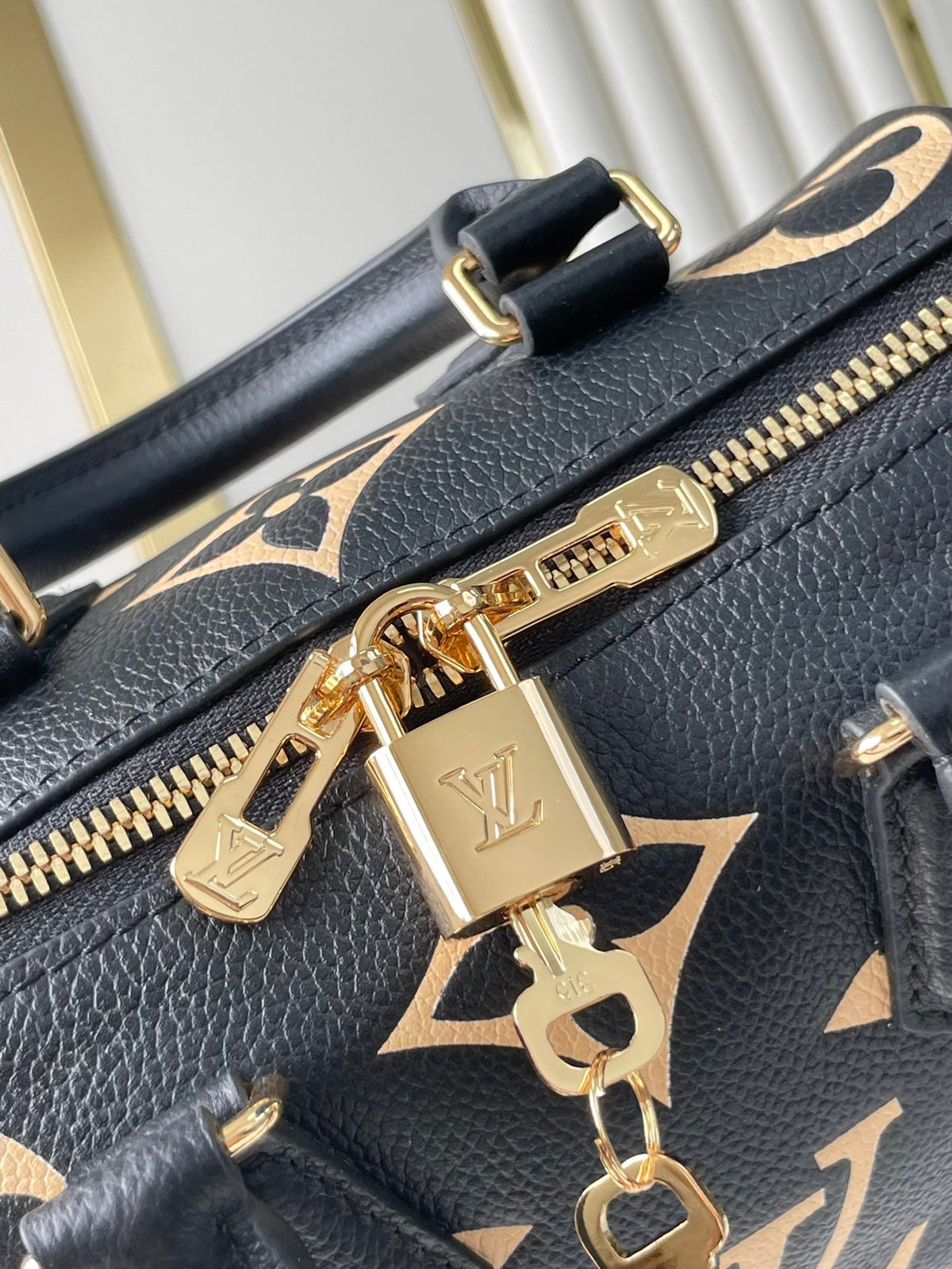 Speedy Bandoulière 20 in Black Cream Monogram Empreinte Leather Gold Hardware