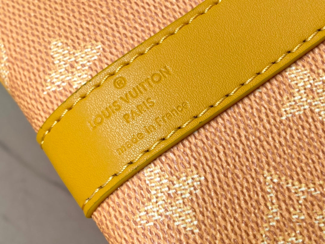 Keepall Bandoulière 55 in Orange Monogram Heritage Canvas