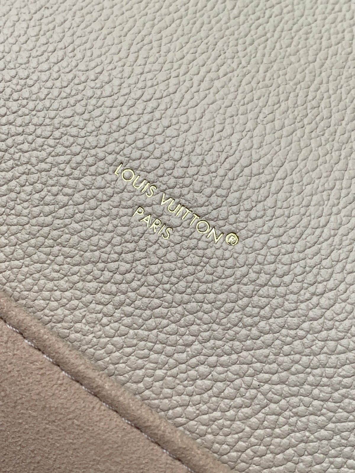 Pochette Métis East West 22 in Light Beige Monogram Empreinte Calfskin Embossed