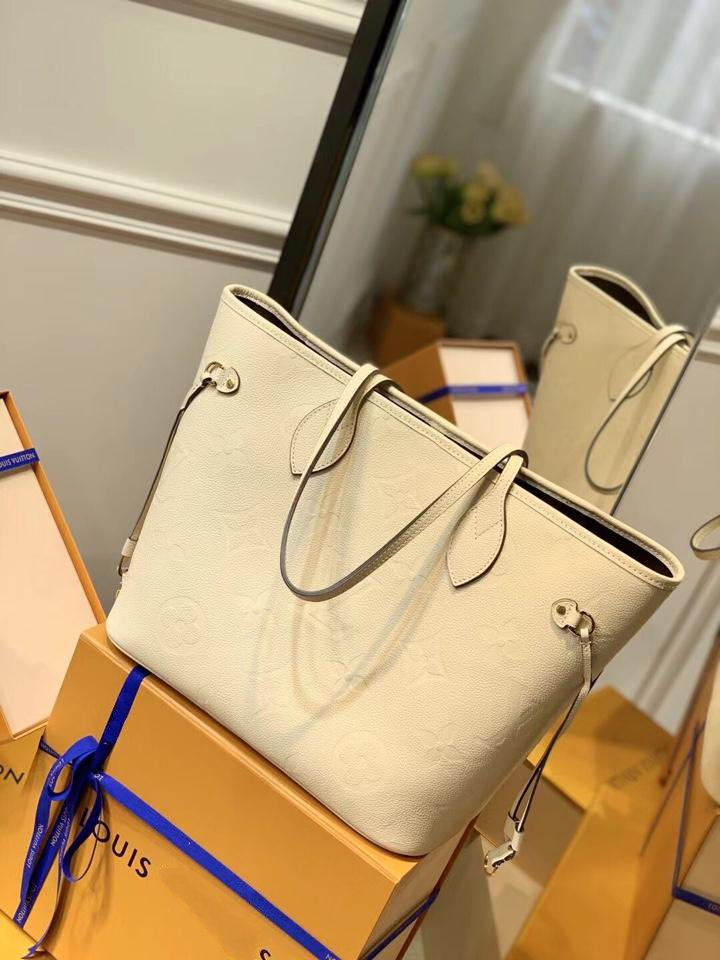 Neverfull MM 32 Cream Embossed Cowhide Leather