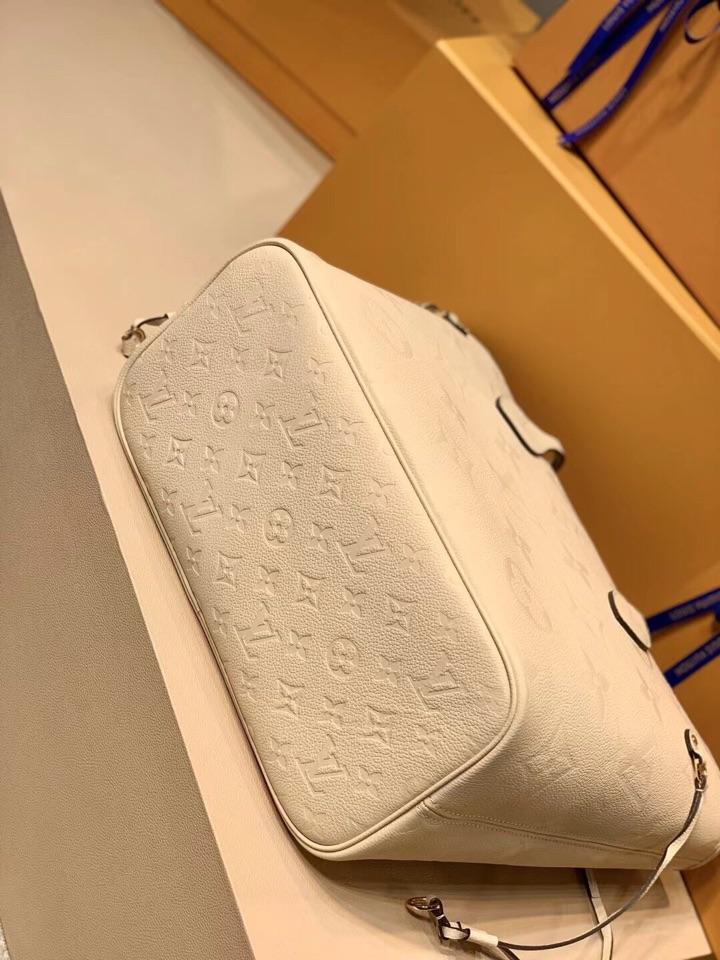 Neverfull MM 32 Cream Embossed Cowhide Leather