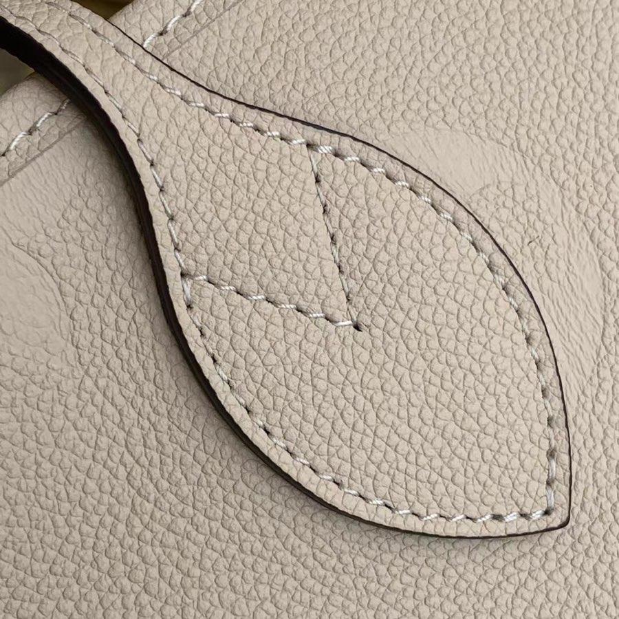 Neverfull MM 32 Cream Embossed Cowhide Leather