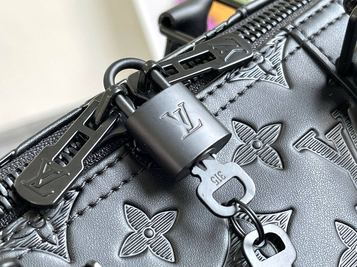 Keepall 50 Bandoulière Black Empreinte Leather