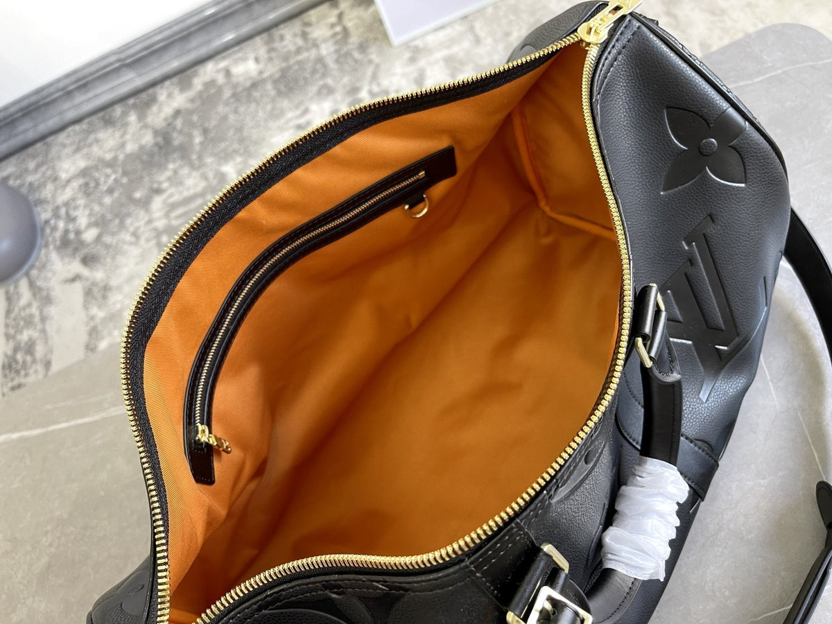 Keepall 45 Bandoulière Monogram Empreinte Giant
