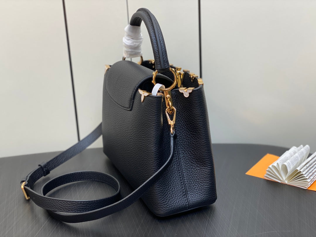 Capucines MM 31 Black Taurillon Gold Hardware