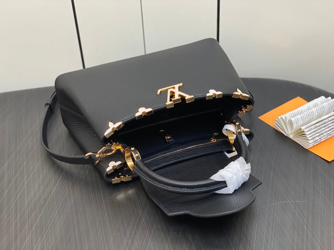 Capucines MM 31 Black Taurillon Gold Hardware