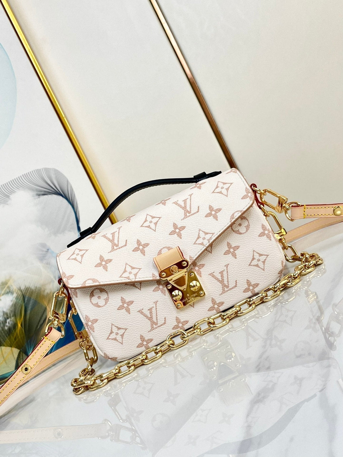 Pochette Metis 21.5 White Brown Monogram Canvas