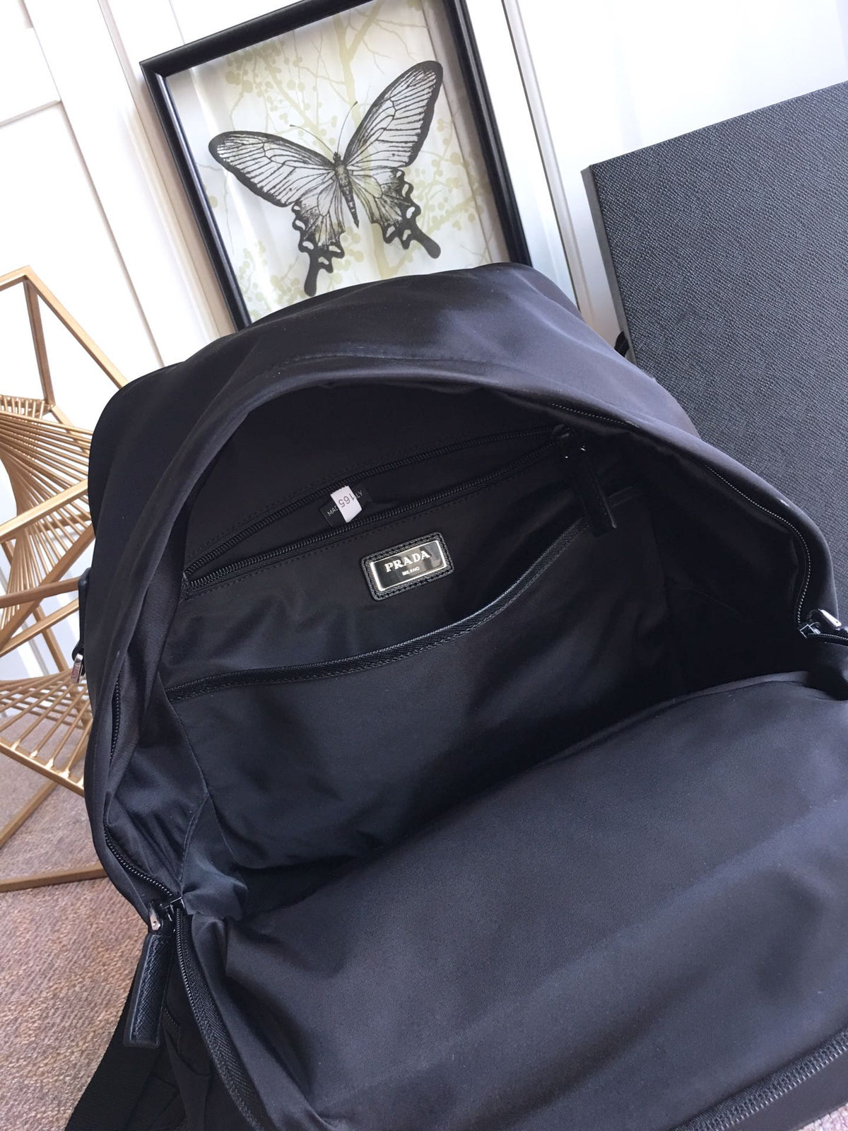 Triangle Logo Backpack 40 in Black Re-nylon