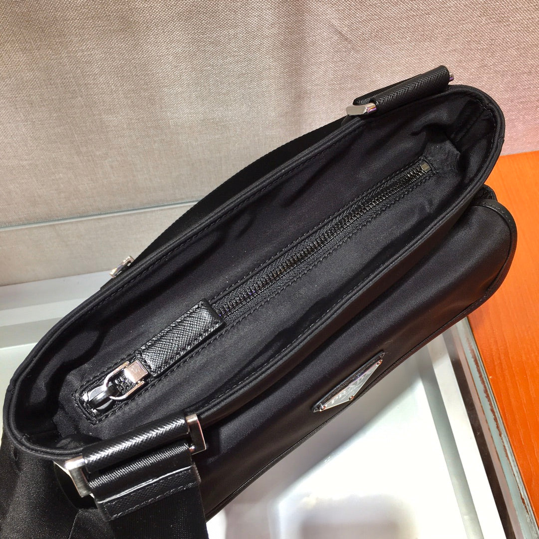Triangle Logo Crossbody Bag 25 in Black Re-nylon and Saffiano Leather Trim