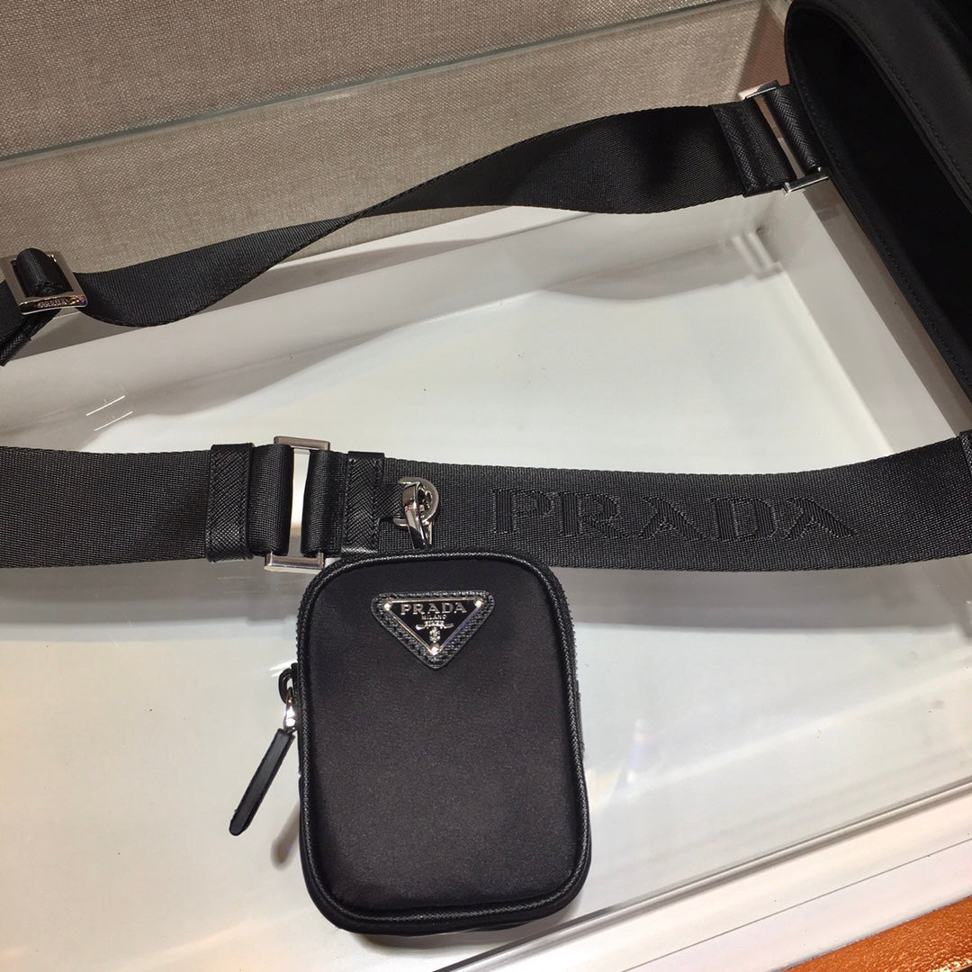 Triangle Logo Crossbody Bag 25 in Black Re-nylon and Saffiano Leather Trim