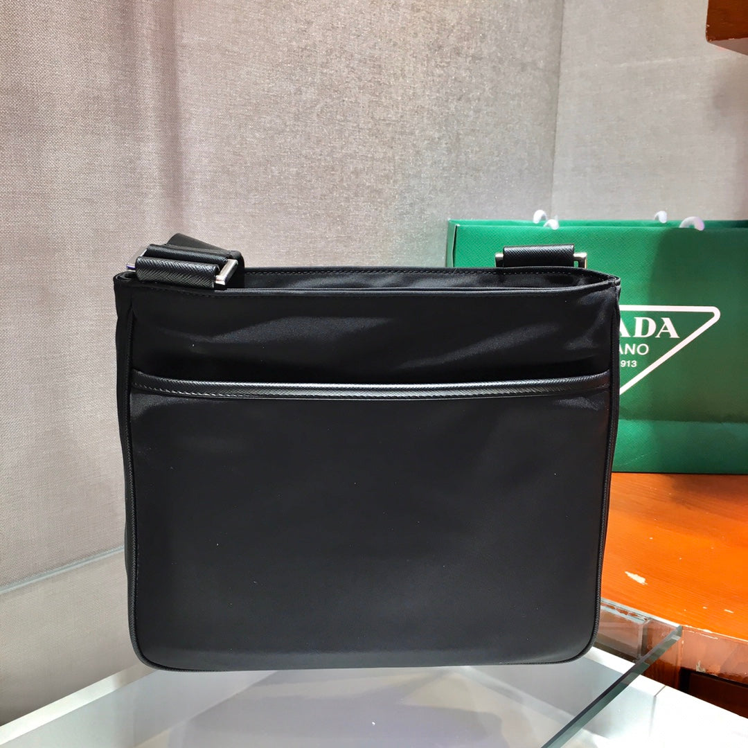 Triangle Logo Crossbody Bag 25 in Black Re-nylon and Saffiano Leather Trim