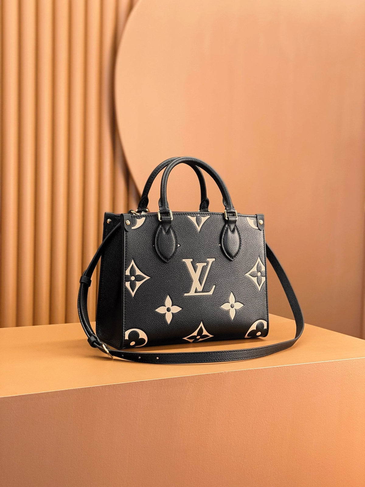 Onthego Tote 25 in Black and Cream Monogram Empreinte