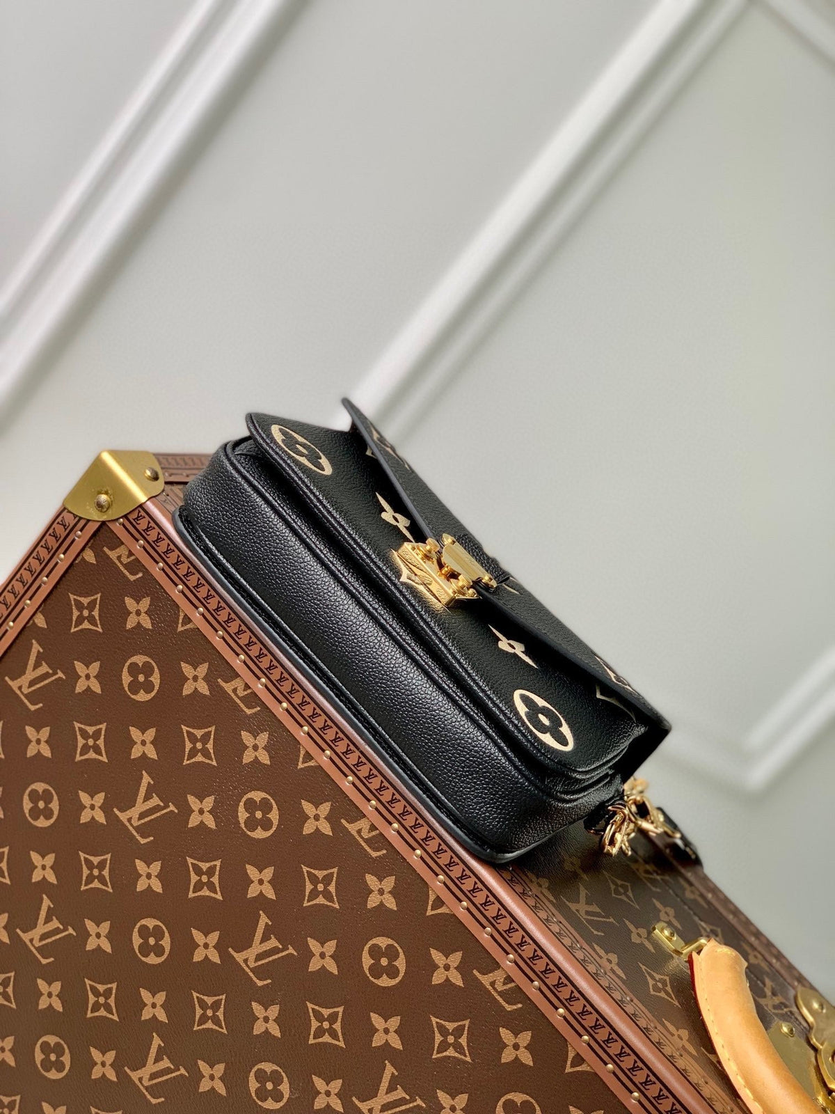 Pochette Métis East West 21 in Black and Beige Monogram Empreinte Calfskin Embossed Logo