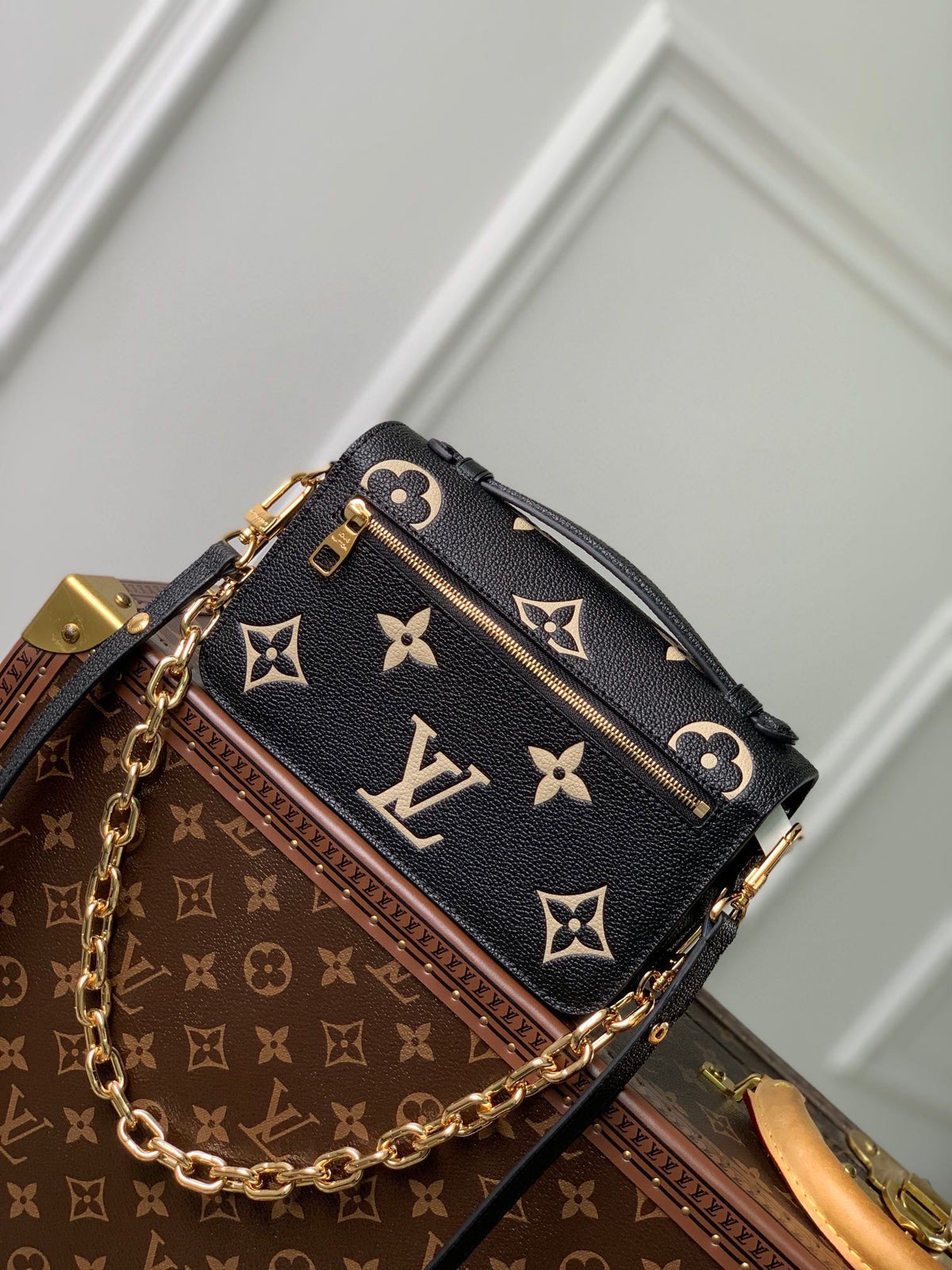Pochette Métis East West 21 in Black and Beige Monogram Empreinte Calfskin Embossed Logo