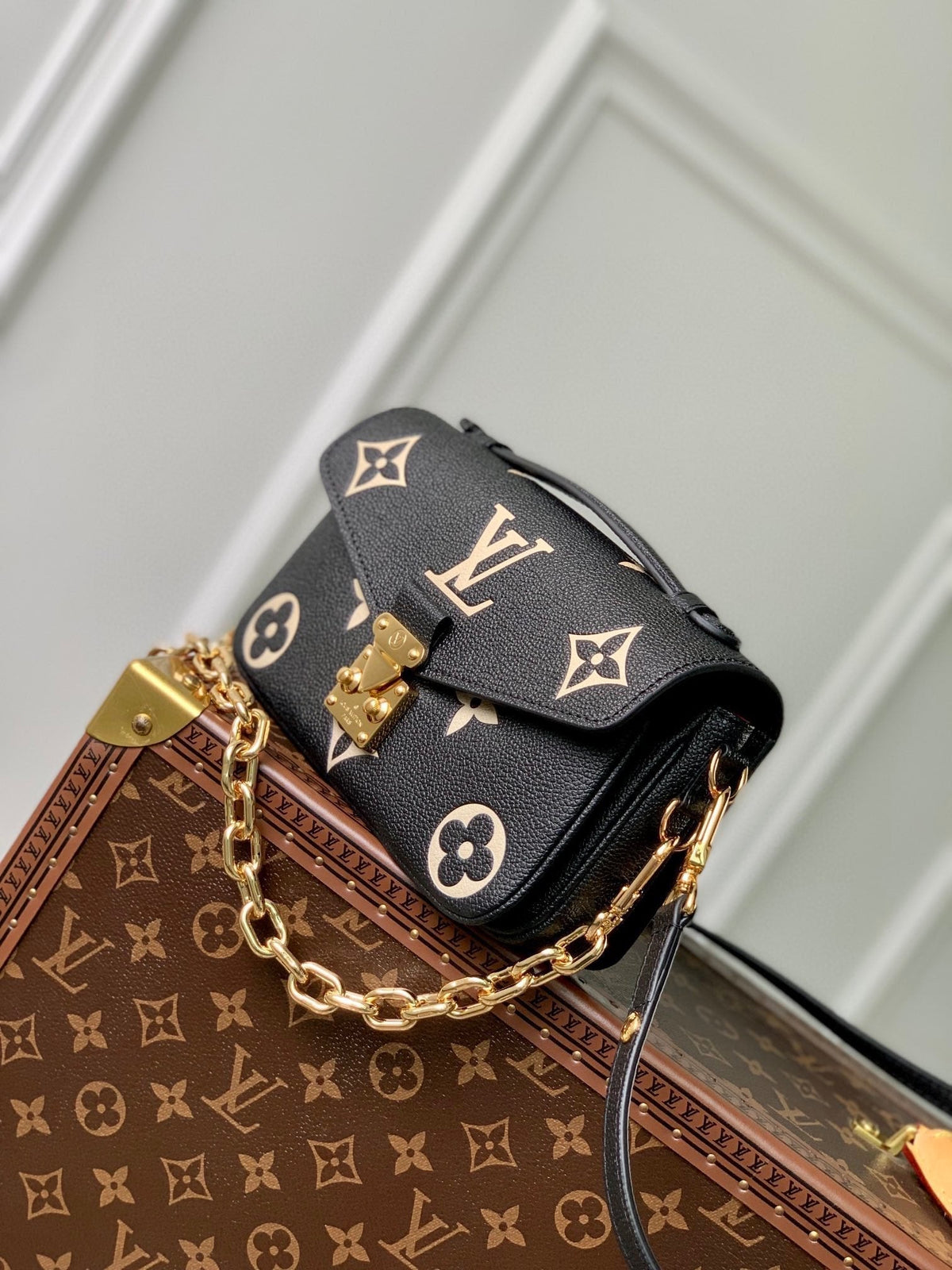Pochette Métis East West 21 in Black and Beige Monogram Empreinte Calfskin Embossed Logo