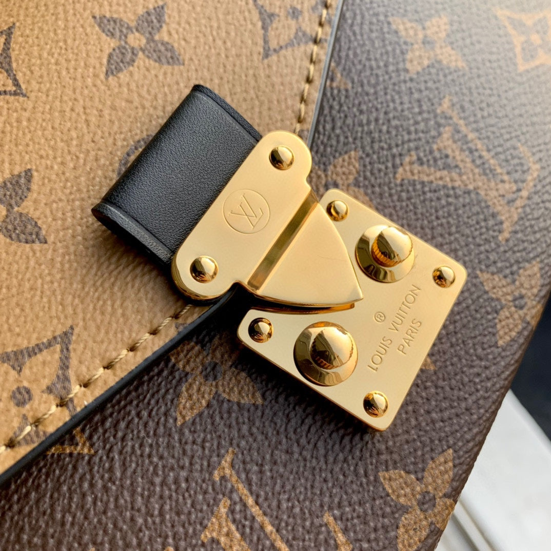 Pochette Métis East West 21.5 in Brown Monogram Coated Canvas and Calfskin