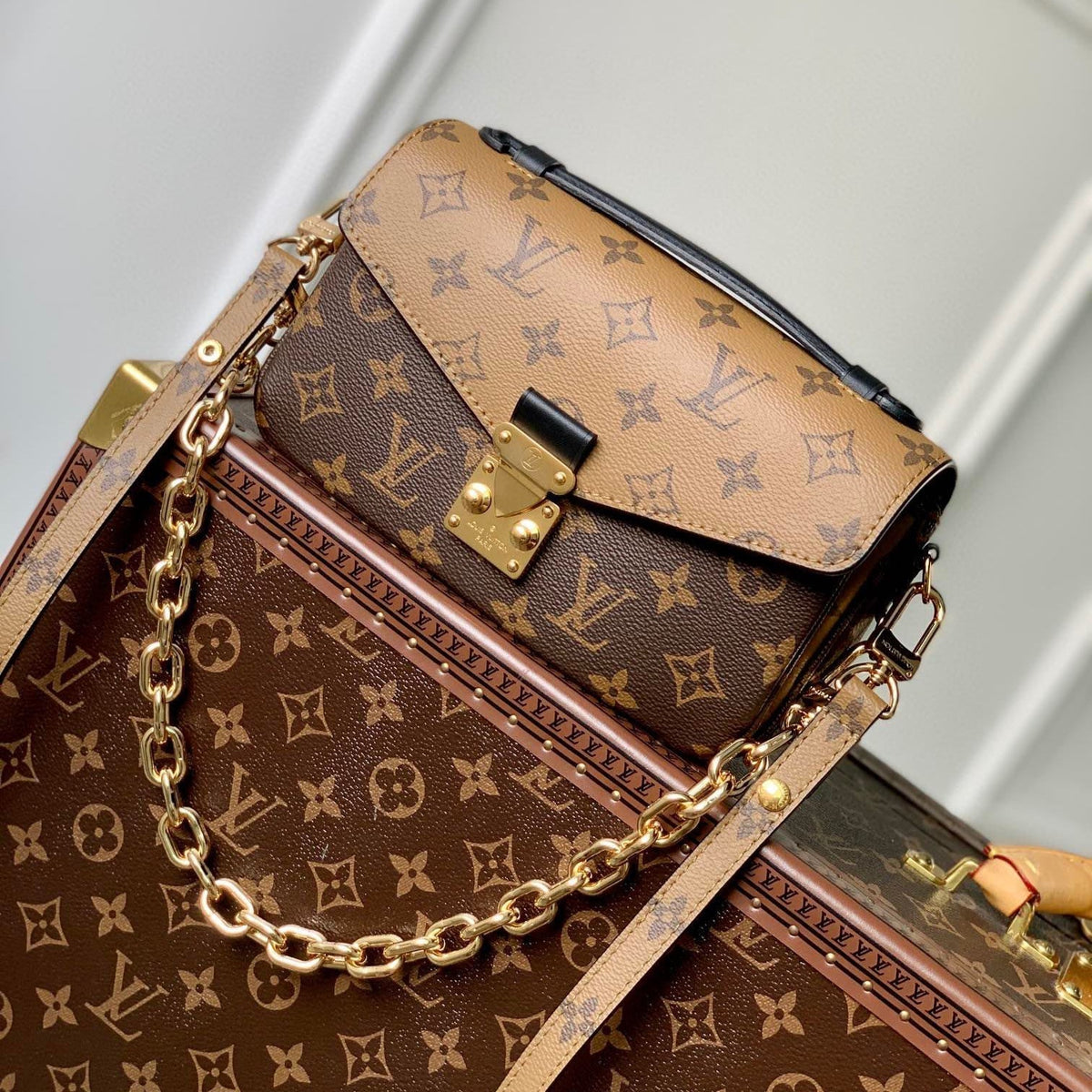 Pochette Métis East West 21.5 in Brown Monogram Coated Canvas and Calfskin