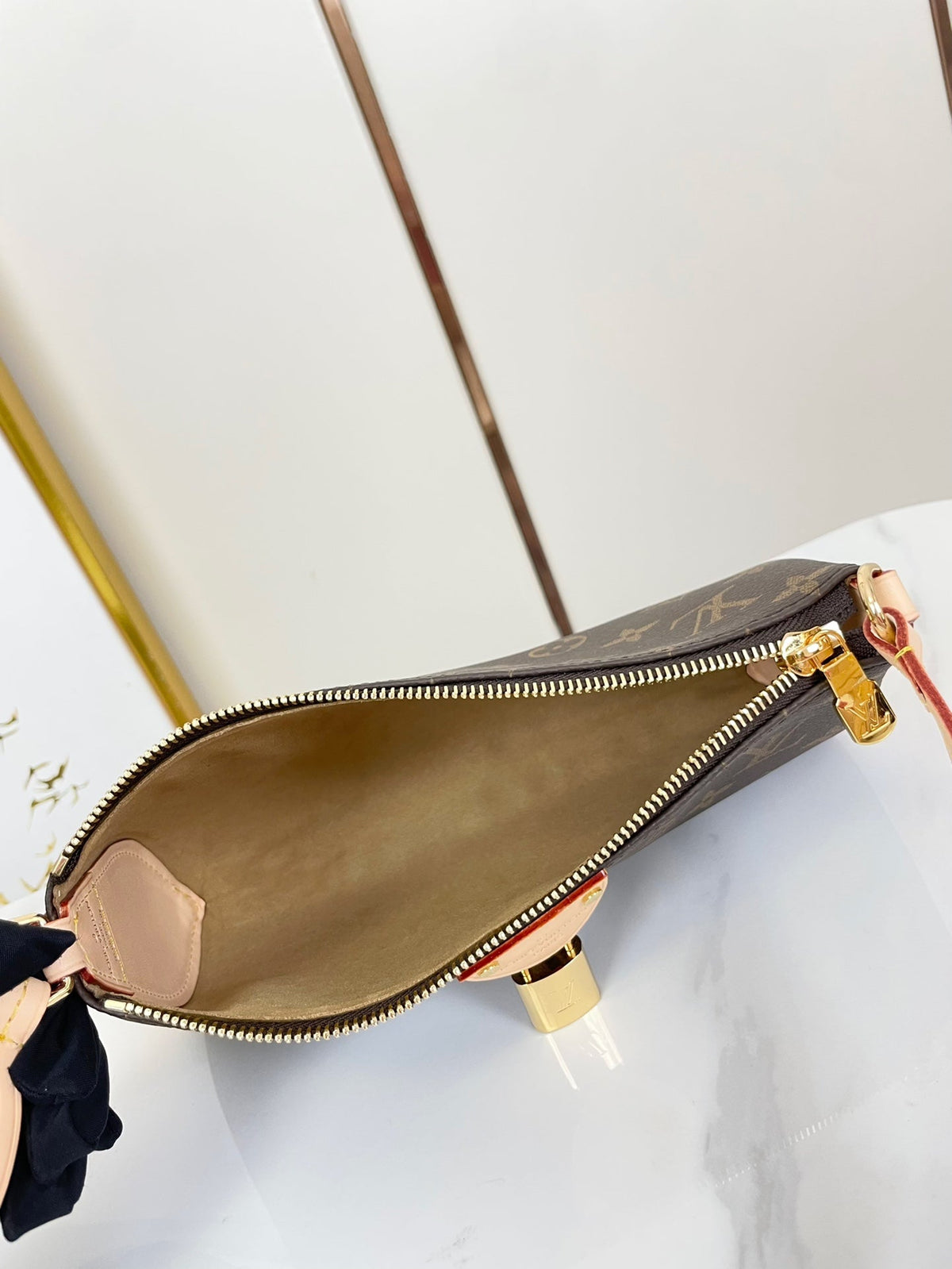 Pochette Tirette 22 in Brown Monogram Canvas Gold Buckle