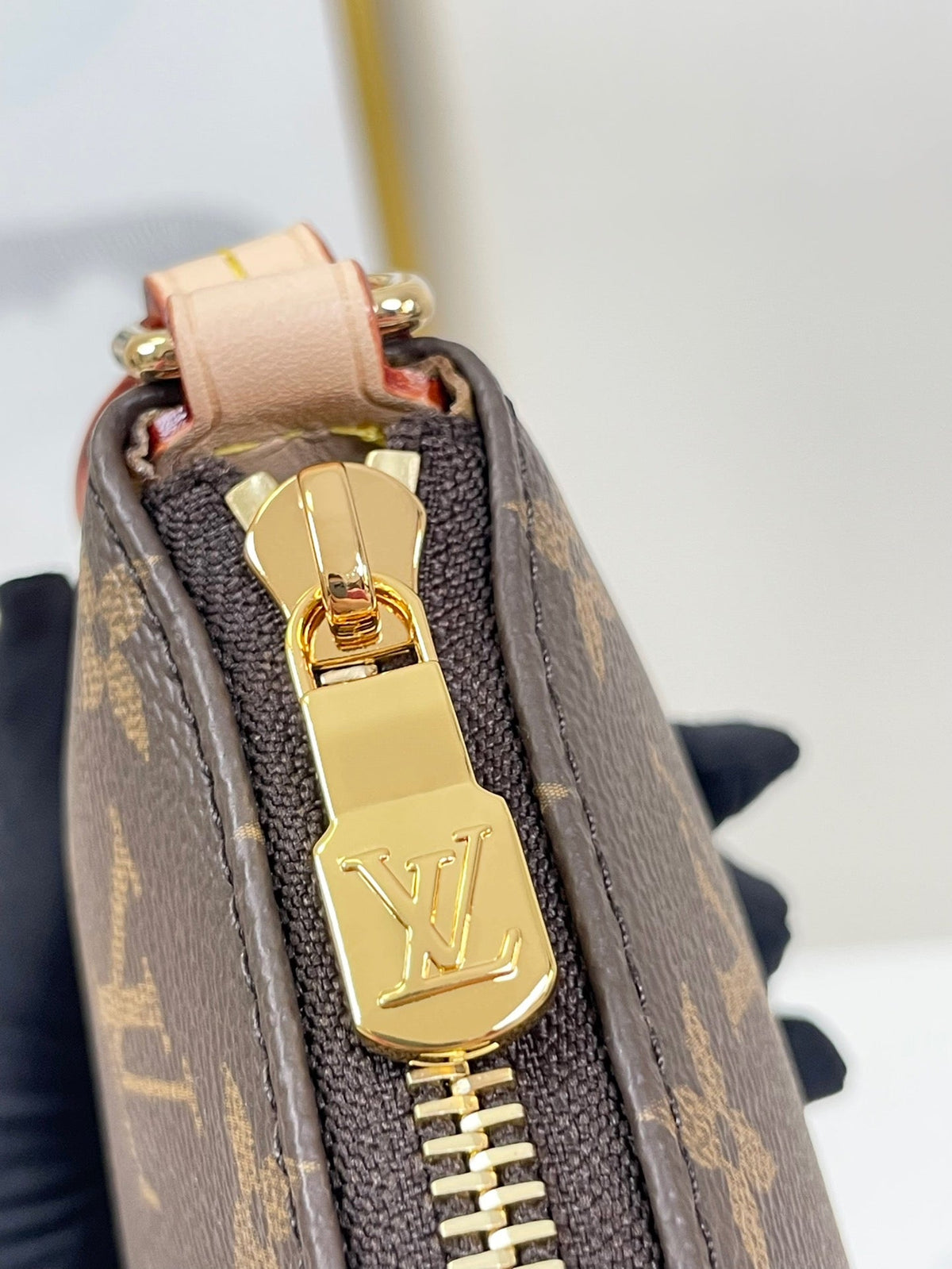Pochette Tirette 22 in Brown Monogram Canvas Gold Buckle