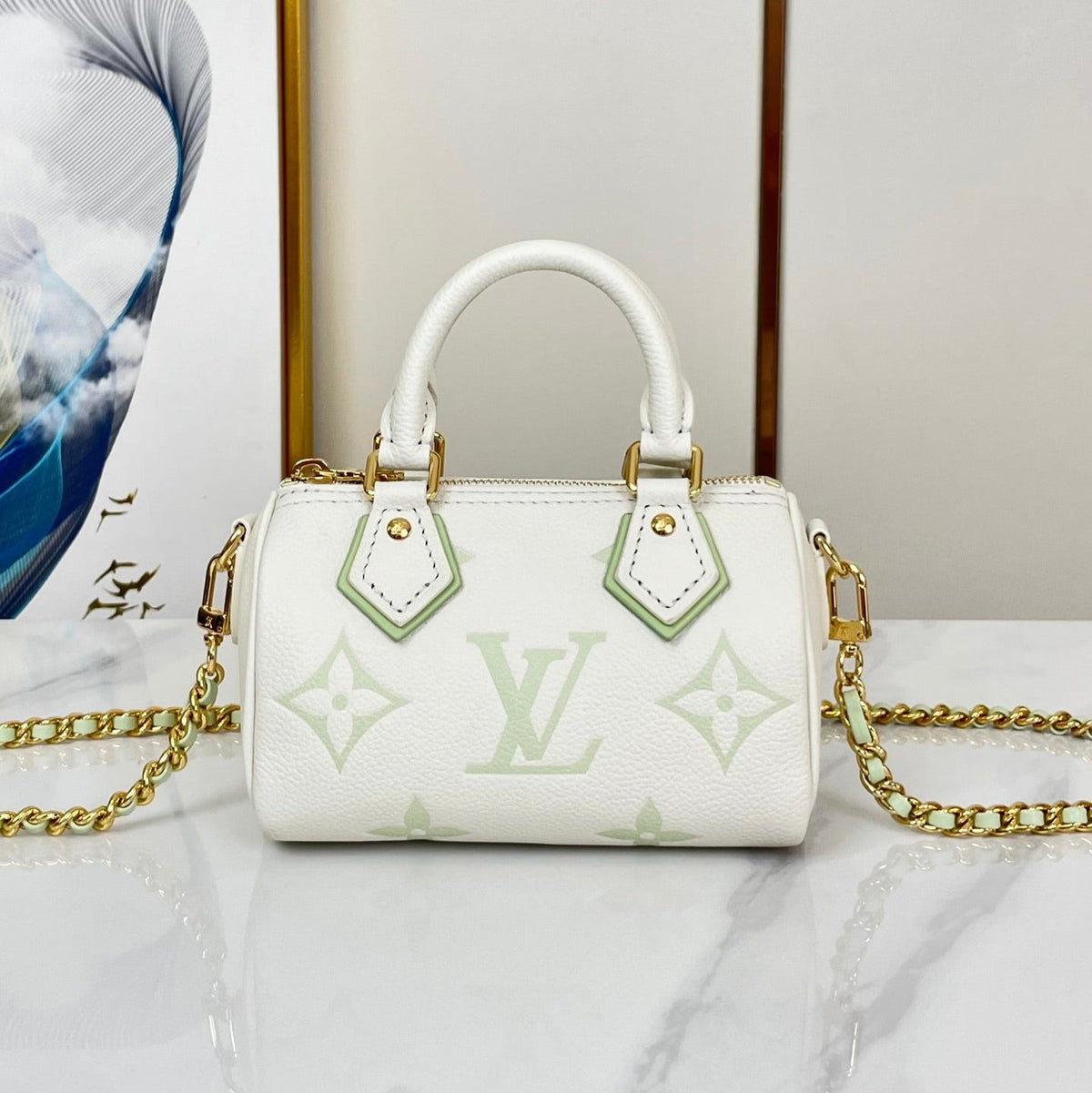 Nano Speedy 16 in White Latte Monogram Empreinte Leather Gold Hardware