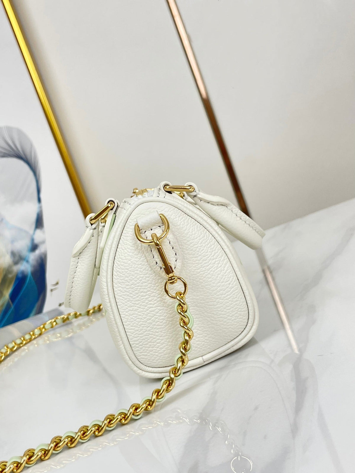 Nano Speedy 16 in White Latte Monogram Empreinte Leather Gold Hardware