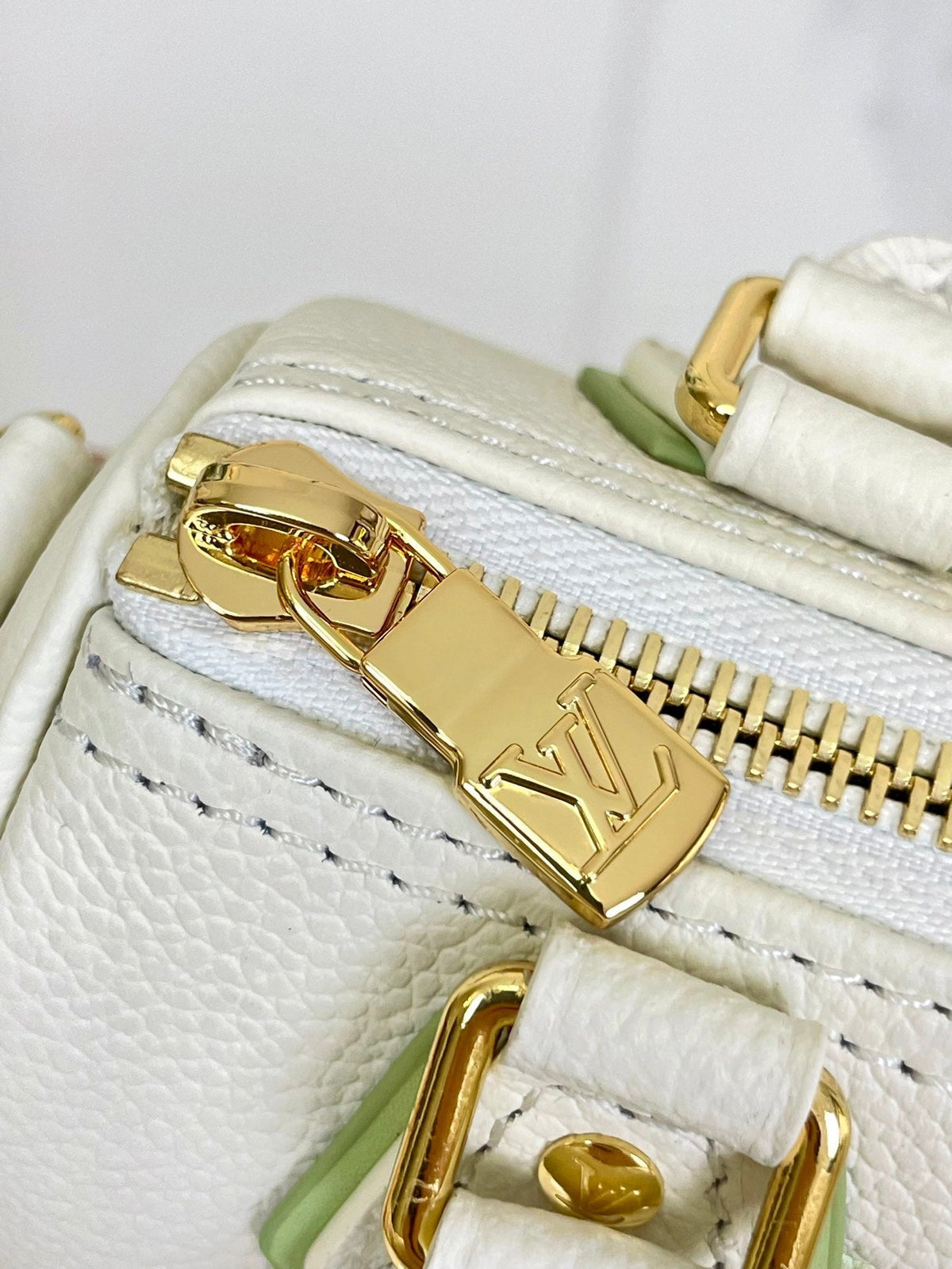 Nano Speedy 16 in White Latte Monogram Empreinte Leather Gold Hardware