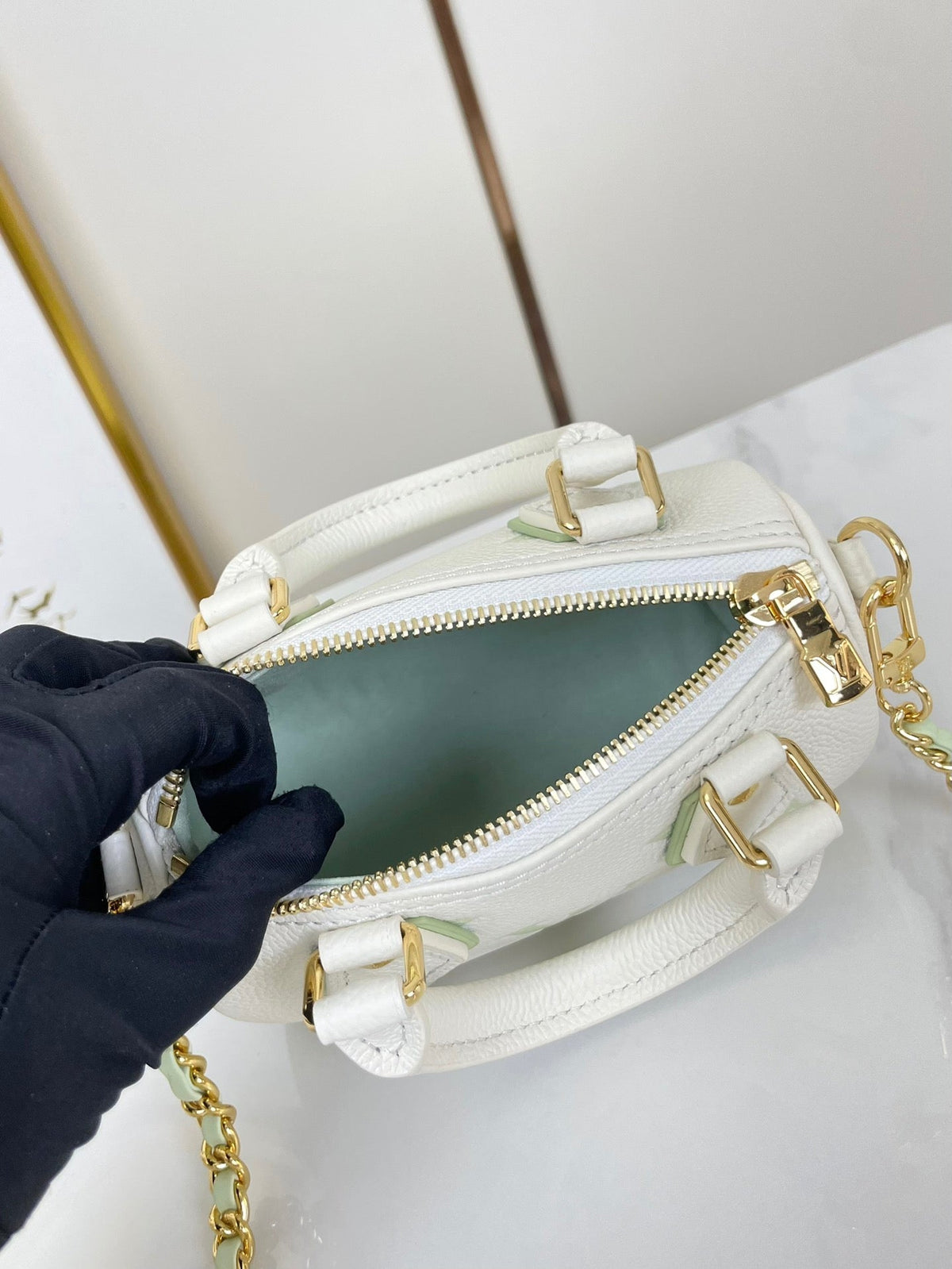 Nano Speedy 16 in White Latte Monogram Empreinte Leather Gold Hardware
