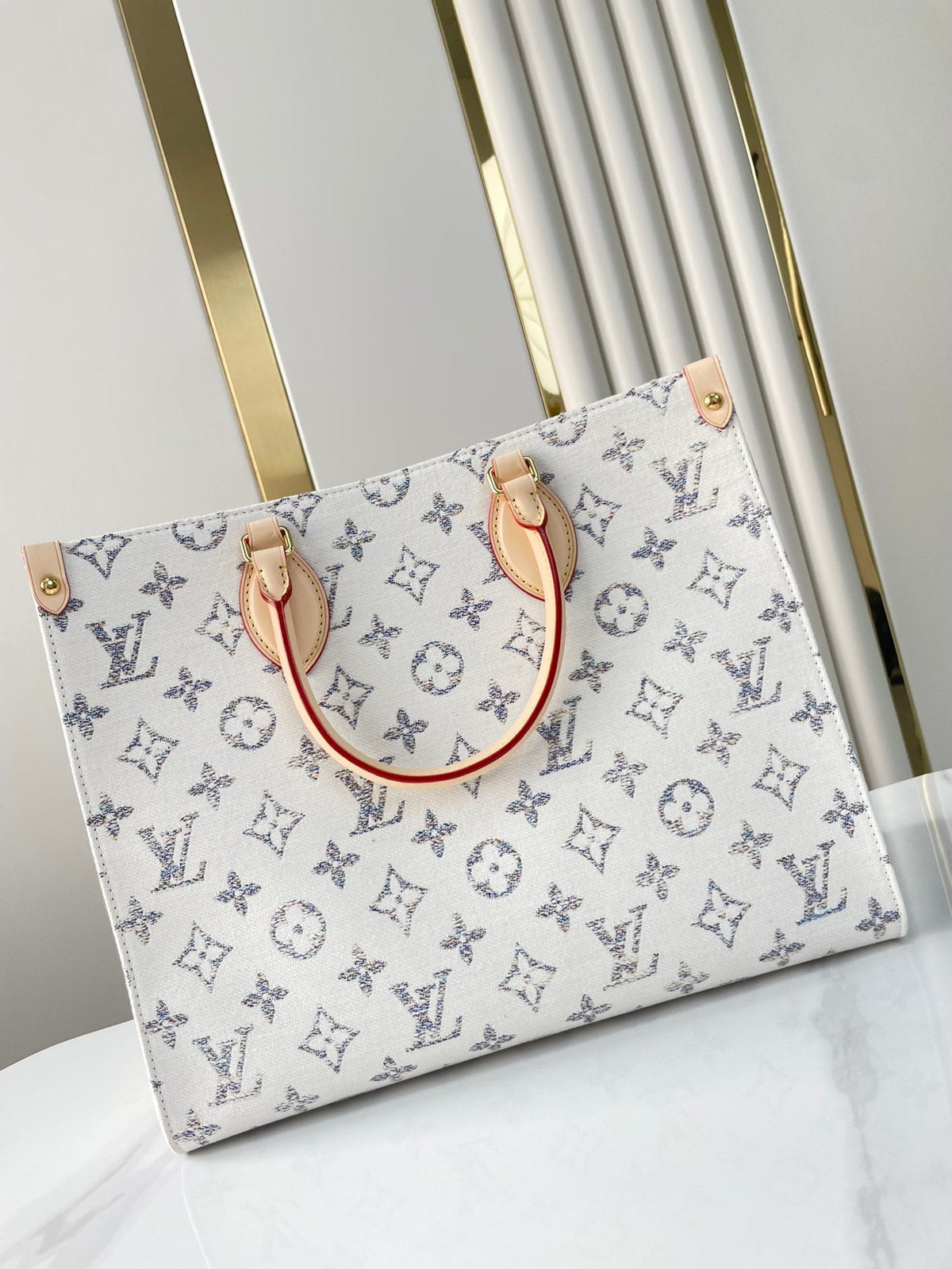 Onthego MM 35 in White Monogram Jacquard Fabric