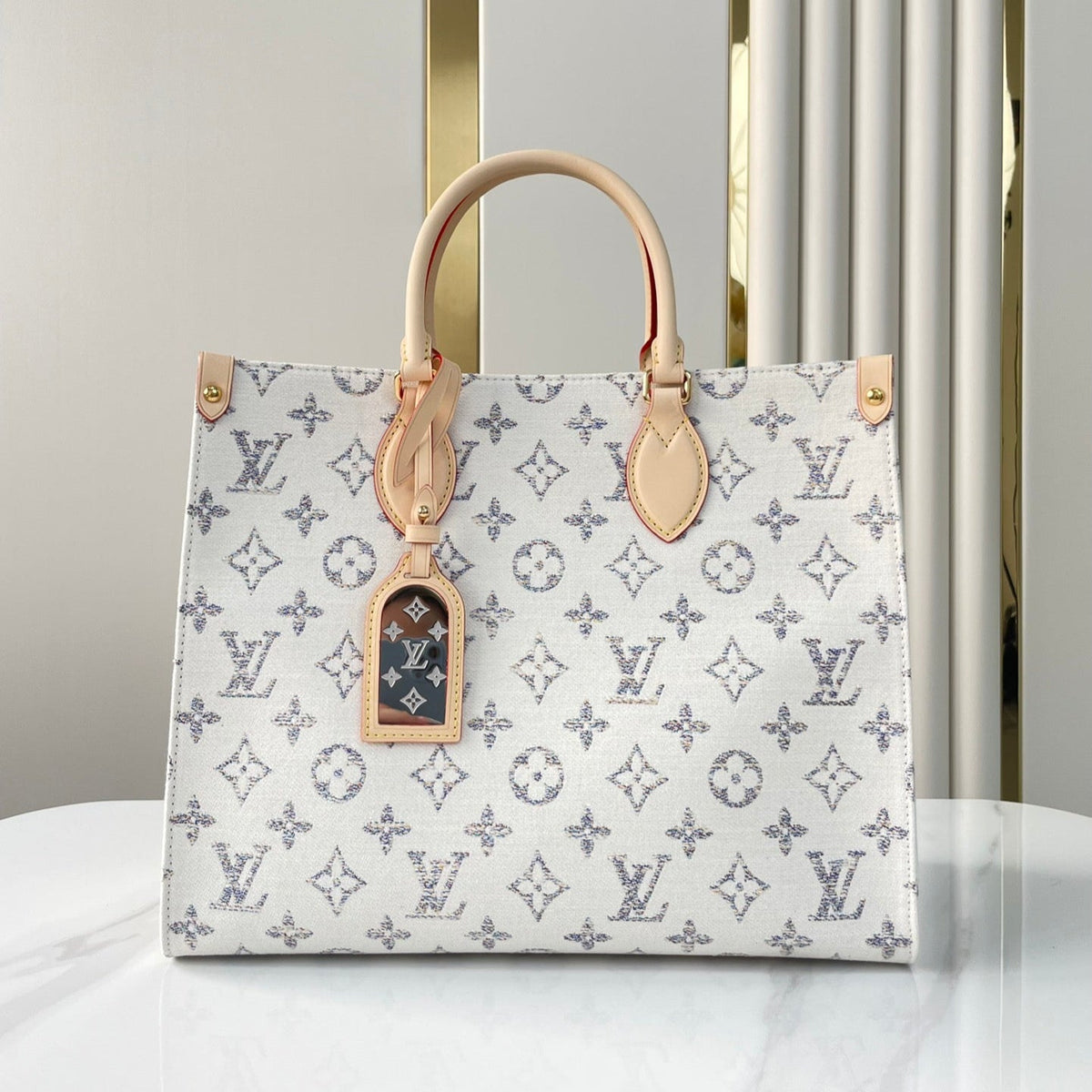 Onthego MM 35 in White Monogram Jacquard Fabric