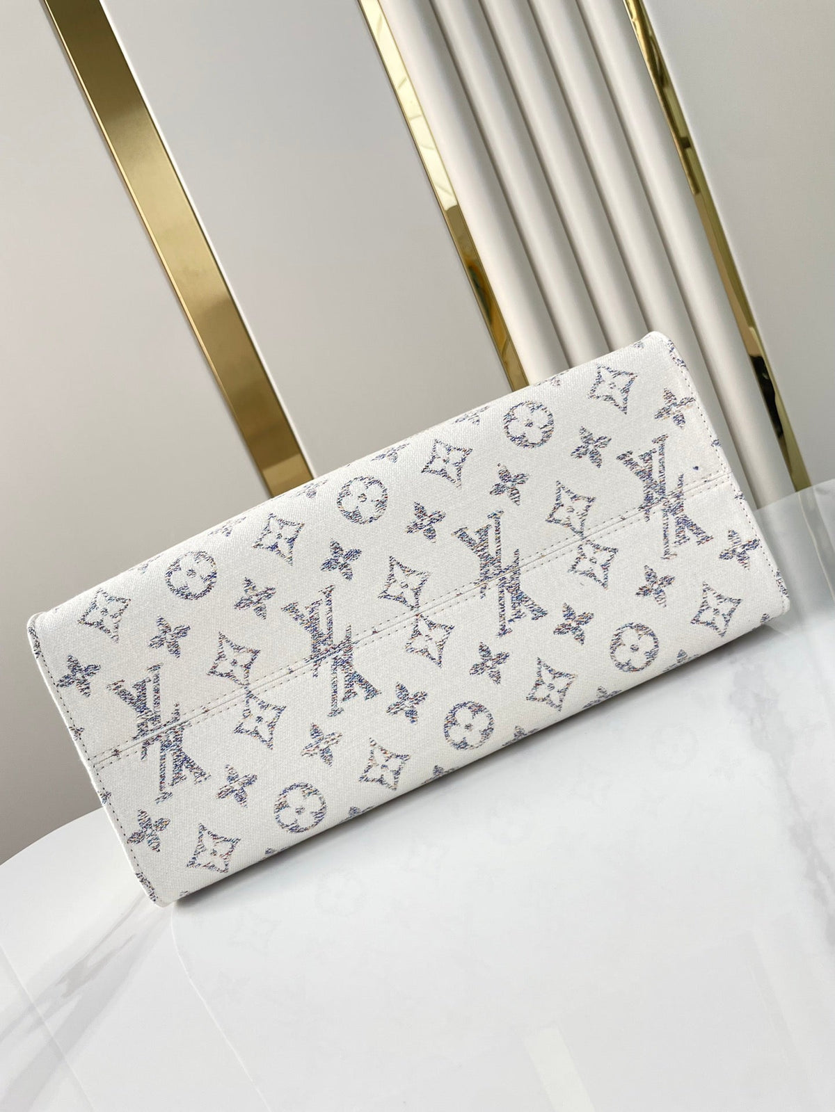 Onthego MM 35 in White Monogram Jacquard Fabric