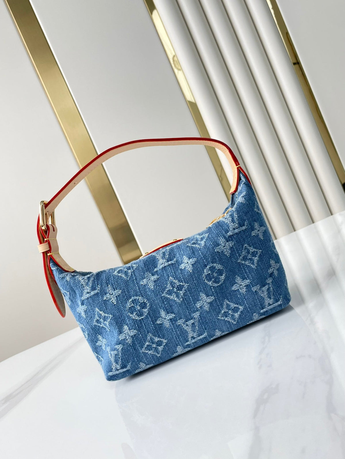 Hills Pochette 18 in Blue Monogram Denim