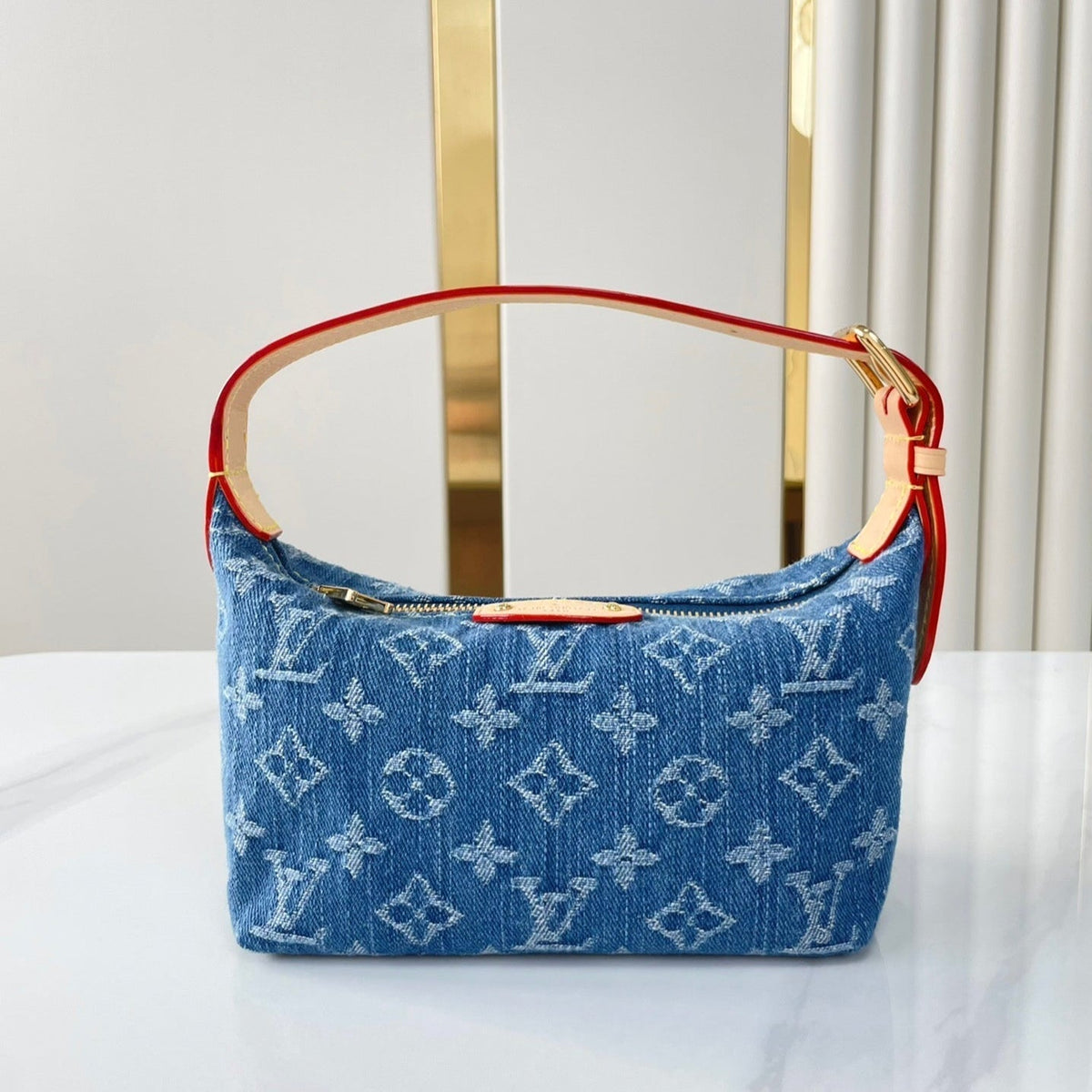 Hills Pochette 18 in Blue Monogram Denim