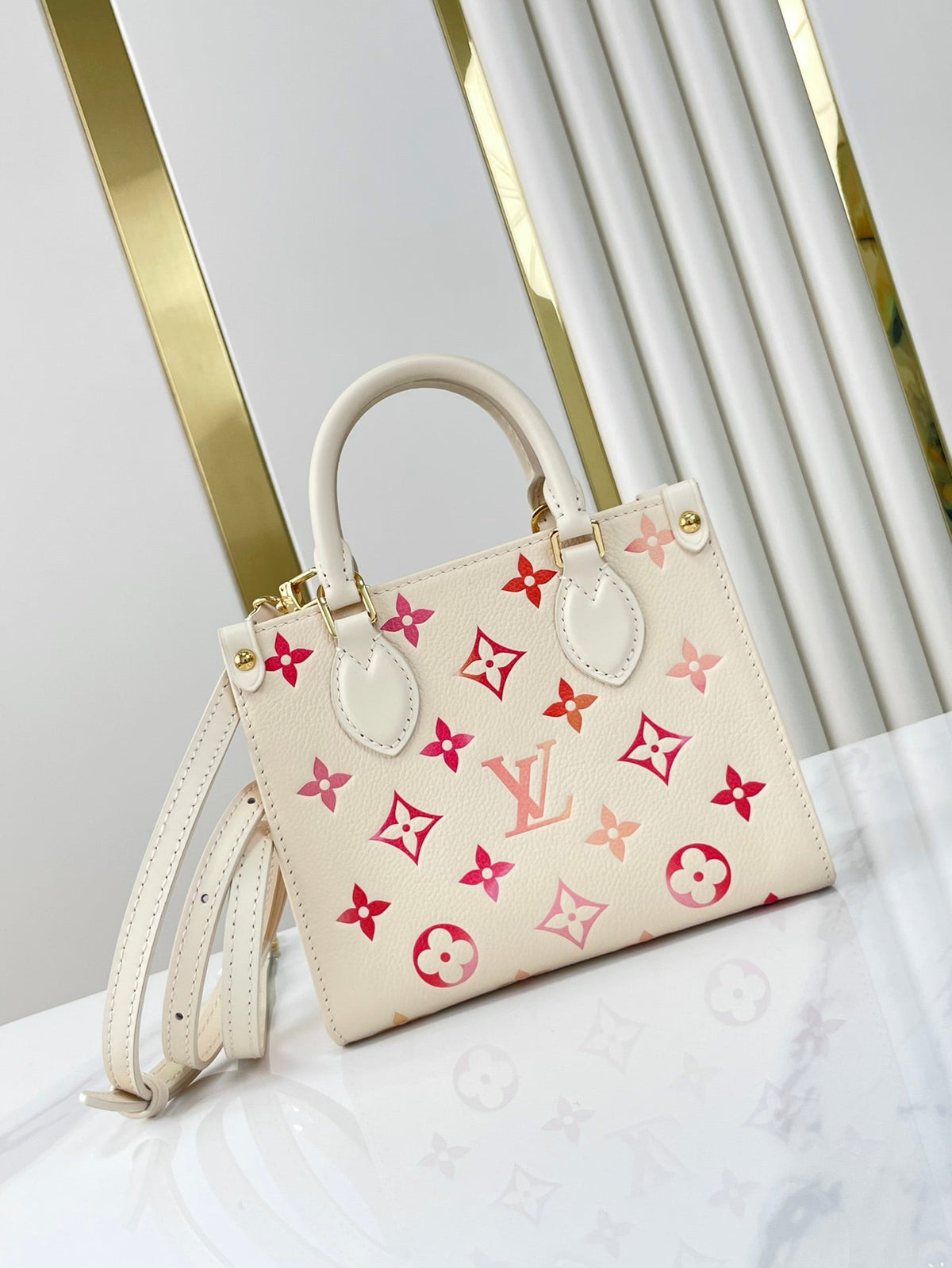 Onthego BB 18 in Sunrise Aquarelle Monogram Empreinte Leather