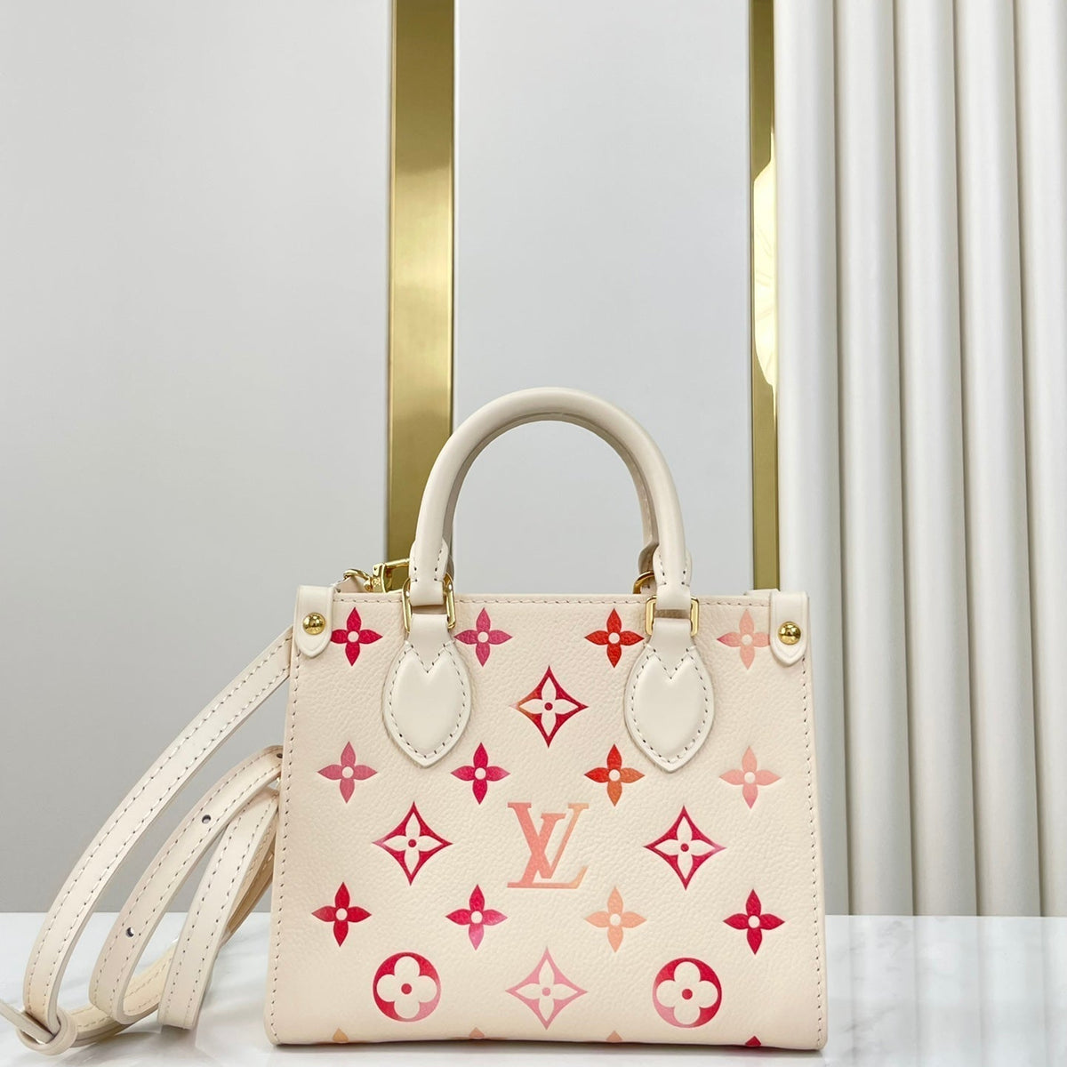 Onthego BB 18 in Sunrise Aquarelle Monogram Empreinte Leather