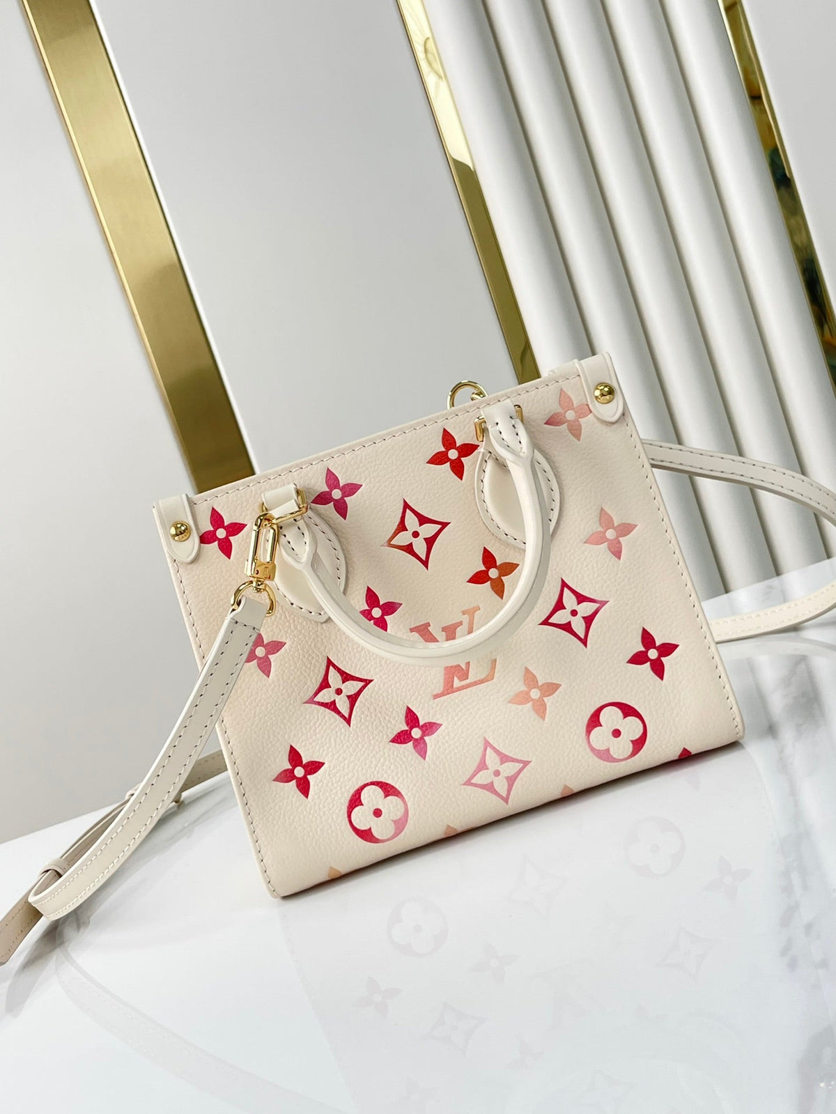 Onthego BB 18 in Sunrise Aquarelle Monogram Empreinte Leather