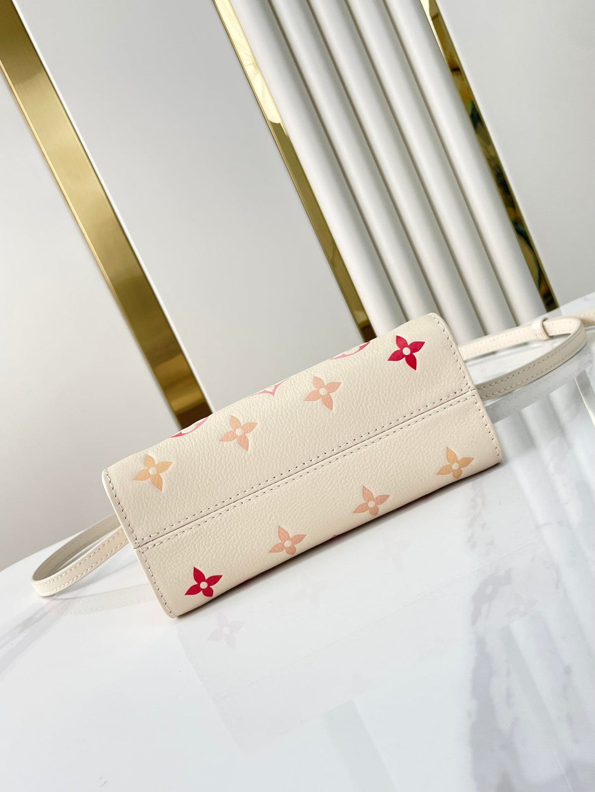 Onthego BB 18 in Sunrise Aquarelle Monogram Empreinte Leather