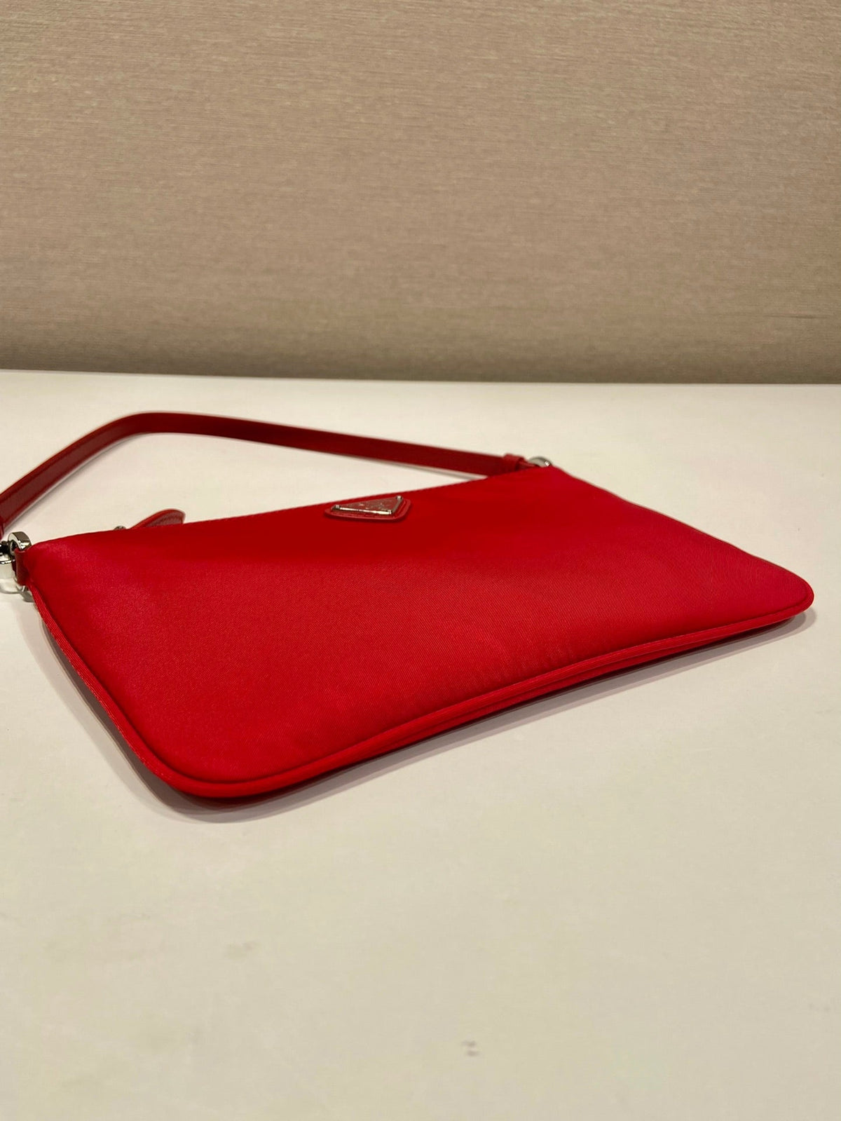 Shoulder Bag 24 with Triangle Logo in Passion Red Re-nylon Fabric