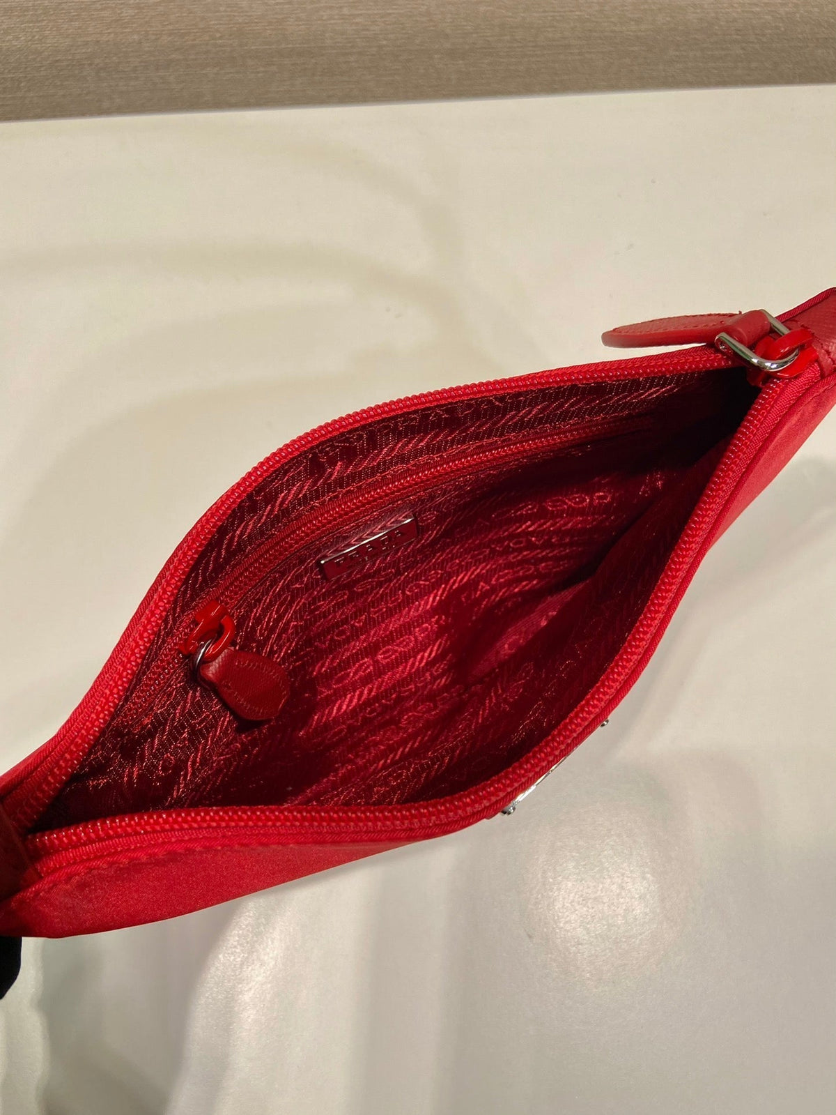 Shoulder Bag 24 with Triangle Logo in Passion Red Re-nylon Fabric