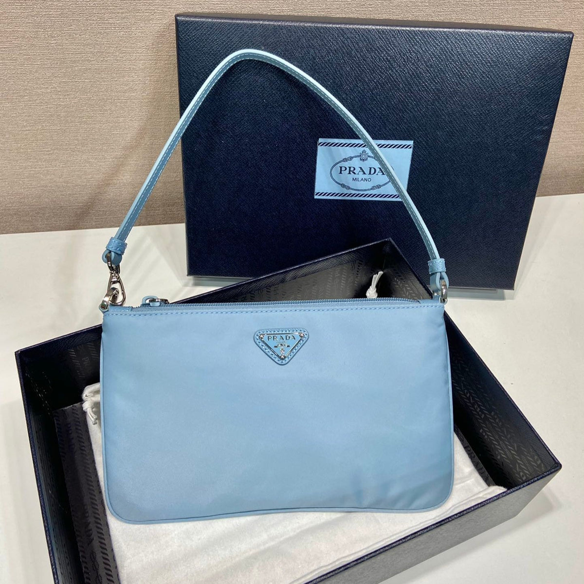 Shoulder Bag 24 with Triangle Logo in Sky Blue Re-nylon Fabric