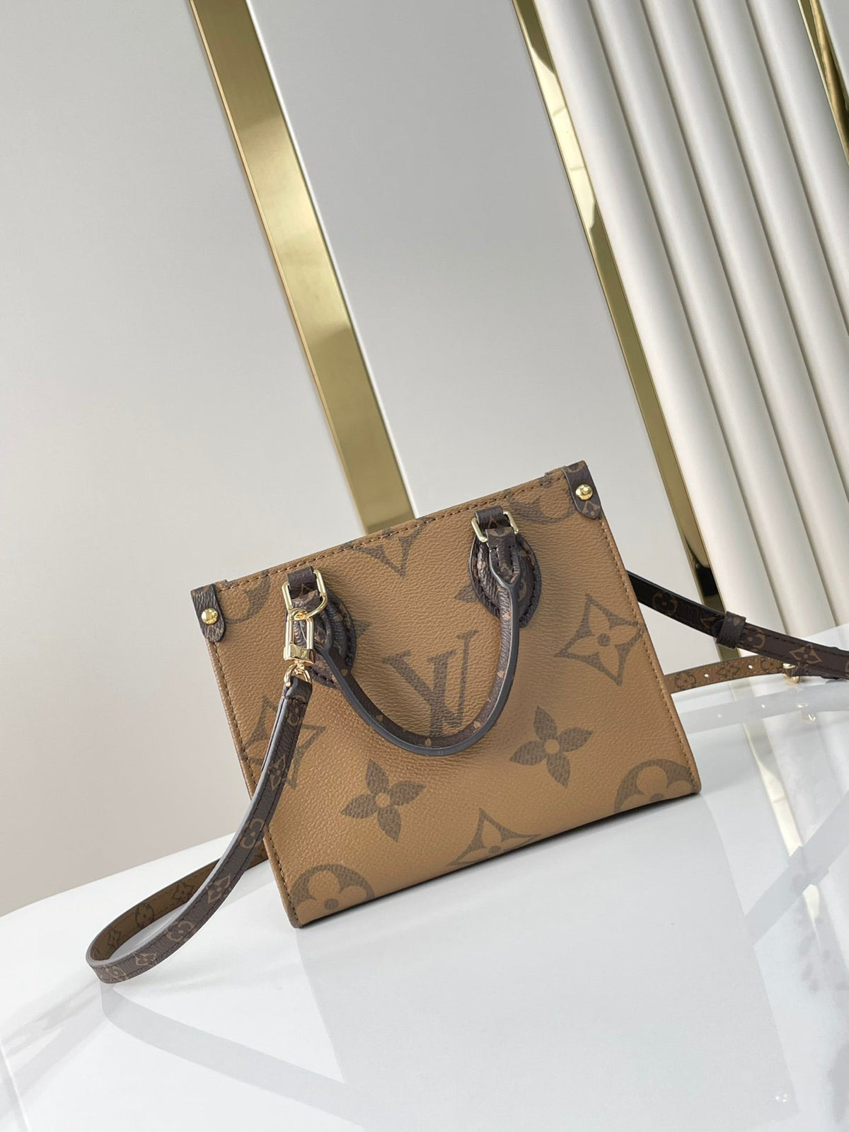 Onthego BB 18 in Brown Monogram and Monogram Reverse Canvas