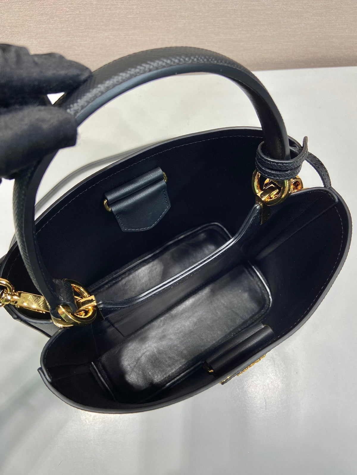 Bucket Bag 23 in Black Saffiano Leather