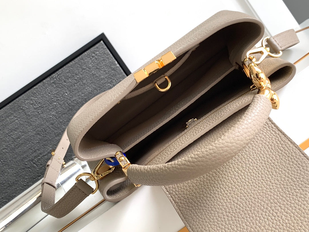 Capucines BB 27 in Khaki Brown Taurillon Gold Hardware