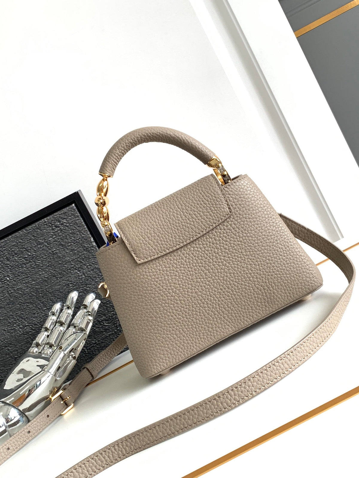 Capucines Mini 21 in Khaki Brown Taurillon Gold Hardware