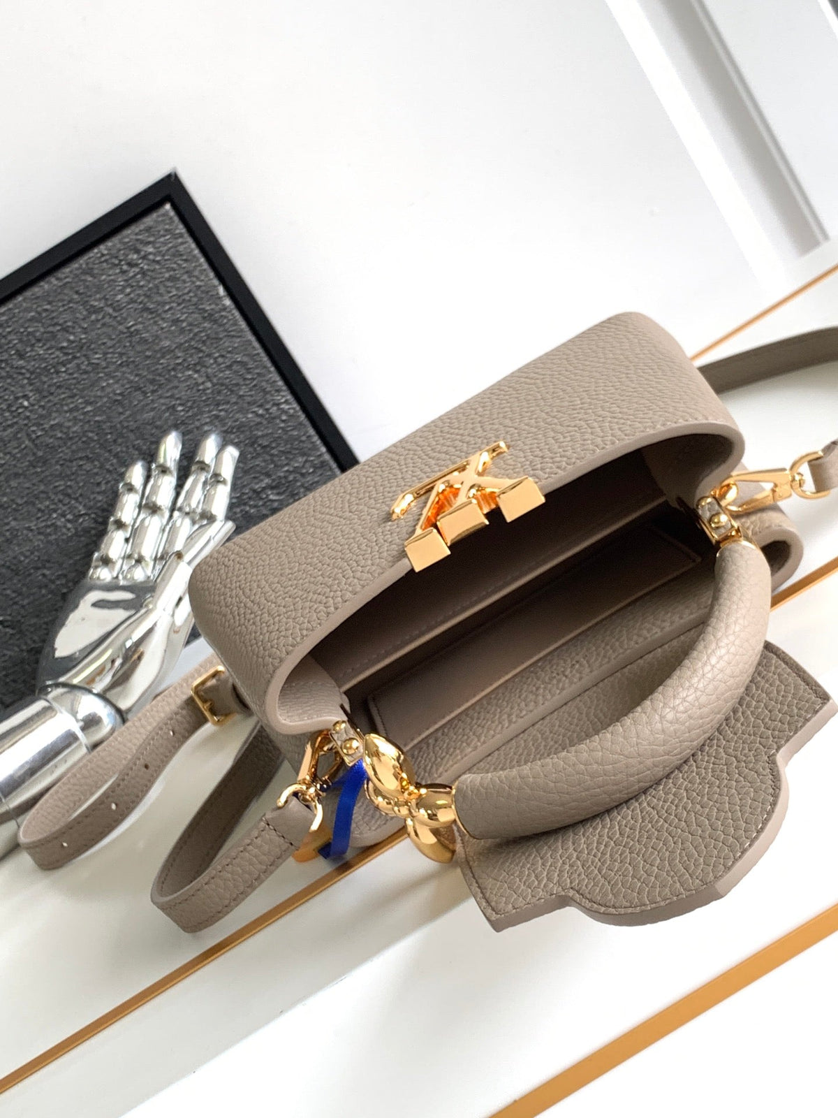 Capucines Mini 21 in Khaki Brown Taurillon Gold Hardware