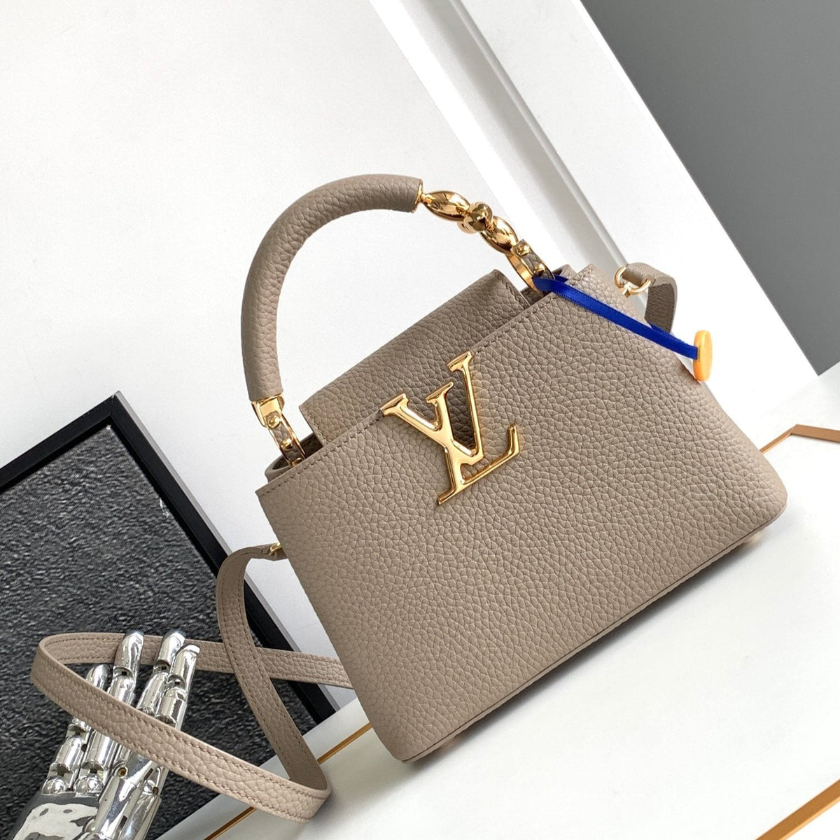 Capucines Mini 21 in Khaki Brown Taurillon Gold Hardware