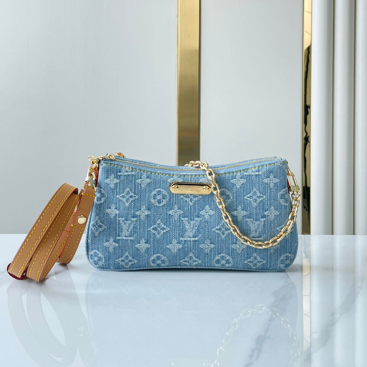 Liv Pochette 24 in Blue Monogram Denim Gold Hardware